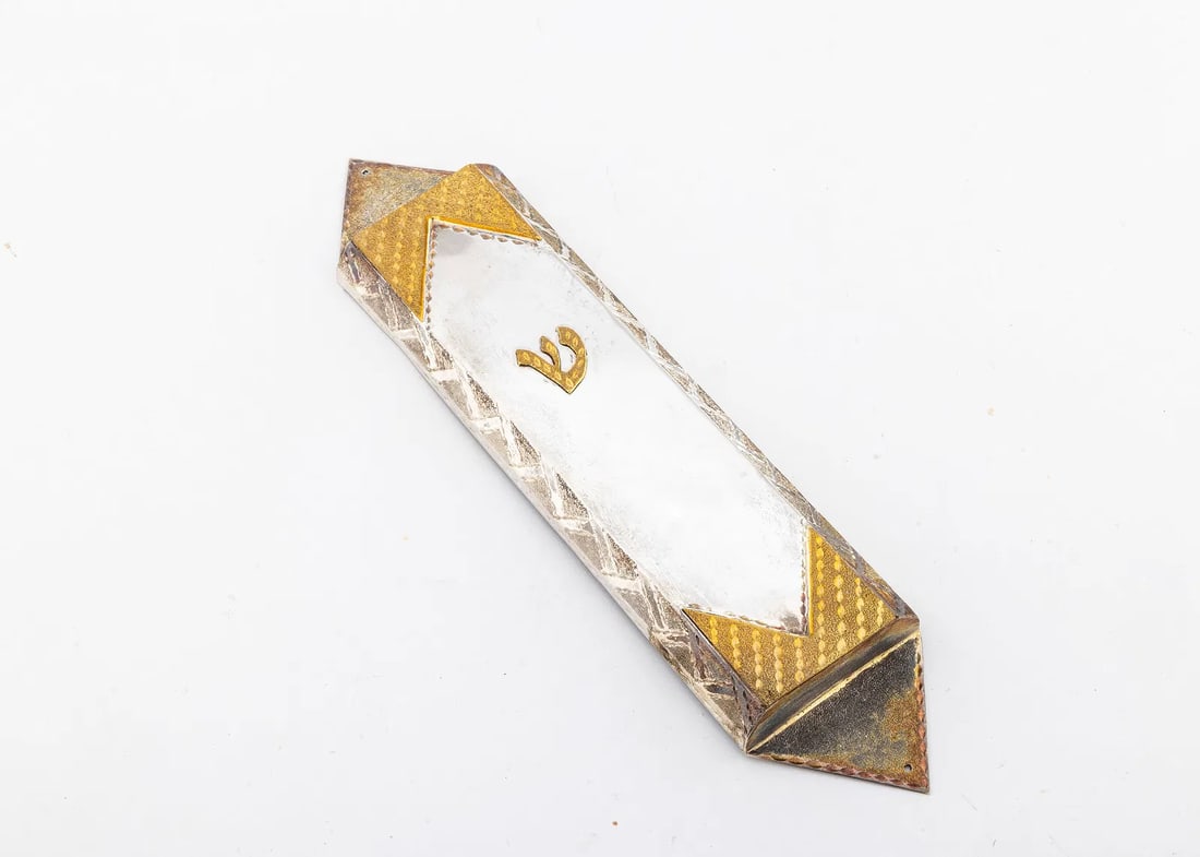 A LARGE STERLING SILVER MEZUZAH CASE. American, c. 2000.: Bright cut design with the original gilding and applied shin. Marked 925 and Sterling. 8.4" tall. 61.9 grams.