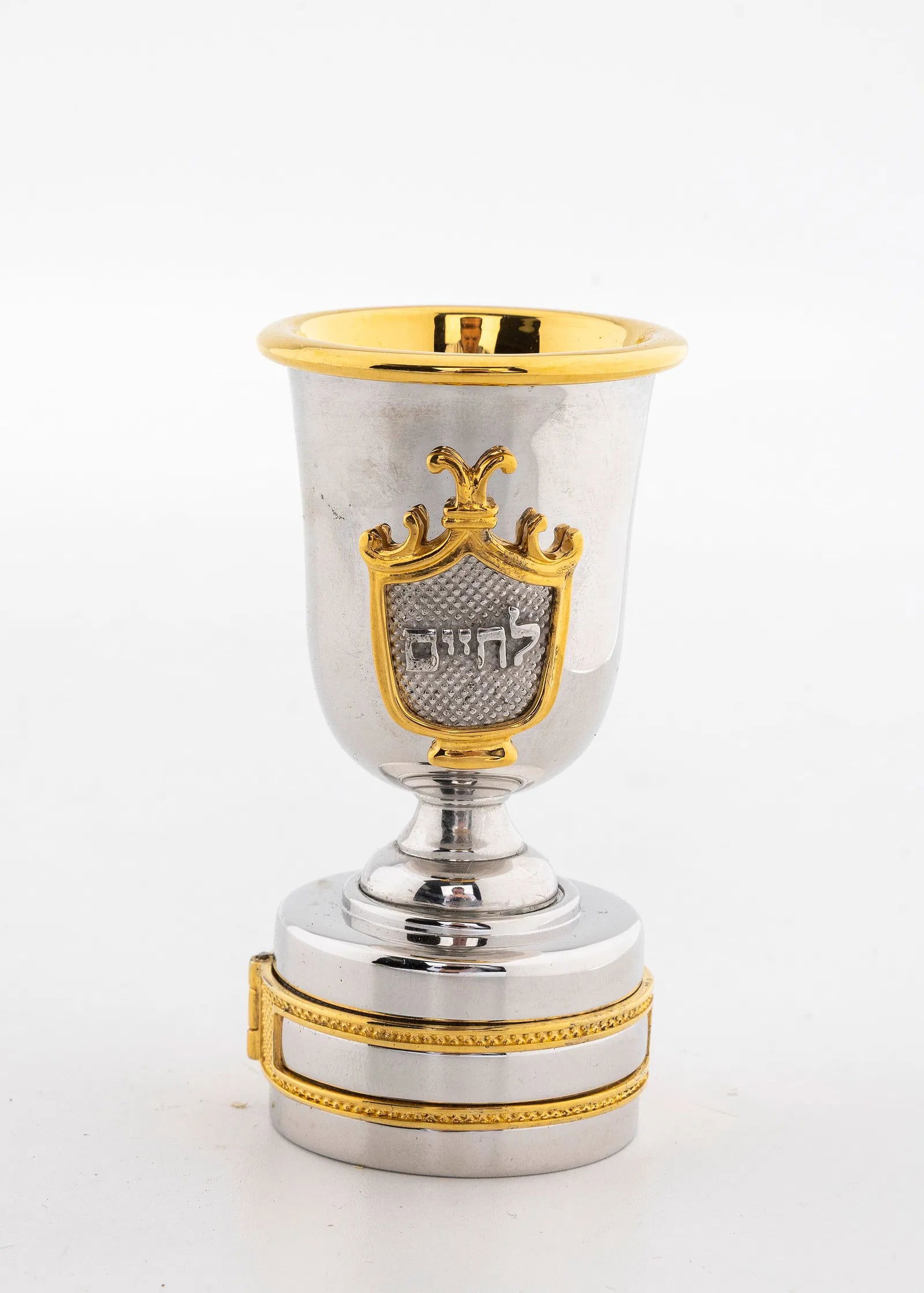 A WHISKEY BOTTLE STOPPER BY SWED MASTER SILVERSMITHS.: Shaped like a wine cup. Signed. Rhodium plated. 2.9" tall.