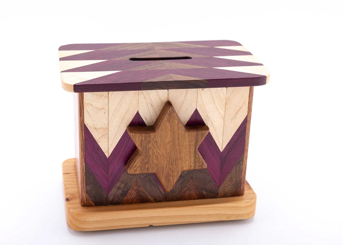 AN INLAID WOOD CHARITY CONTAINER: Probably American, modern. Hand carved and assembled with multicolored inlaid wood designs.