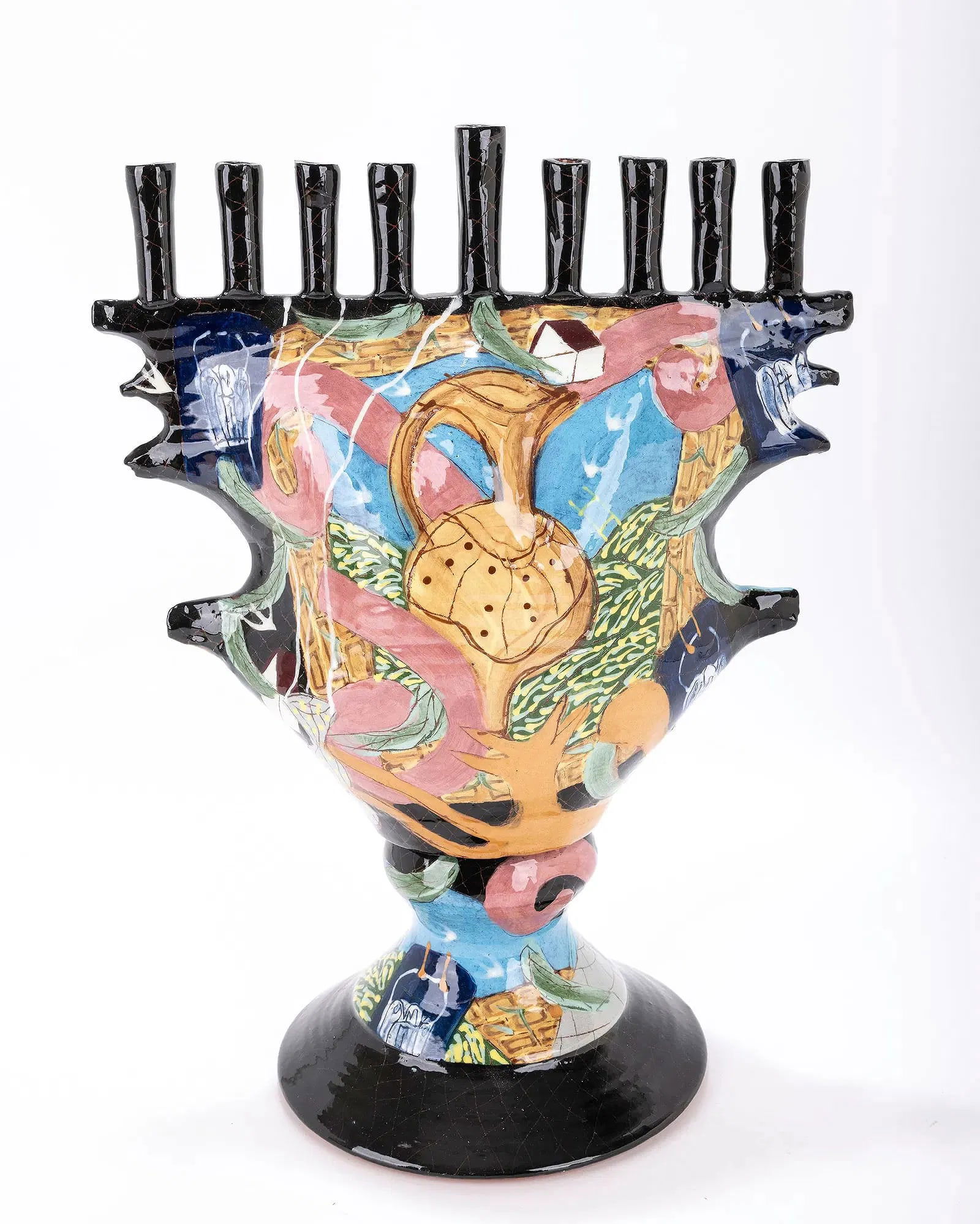 A LARGE CERAMIC HANUKKAH MENORAH BY ROBERT LIPNICK. New York, 1990. Hand painted and glazed.: A LARGE CERAMIC HANUKKAH MENORAH BY ROBERT LIPNICK. New York, 1990. Hand painted and glazed. Decorated with multiple colors. On a round base with a painted body. 14.4”
