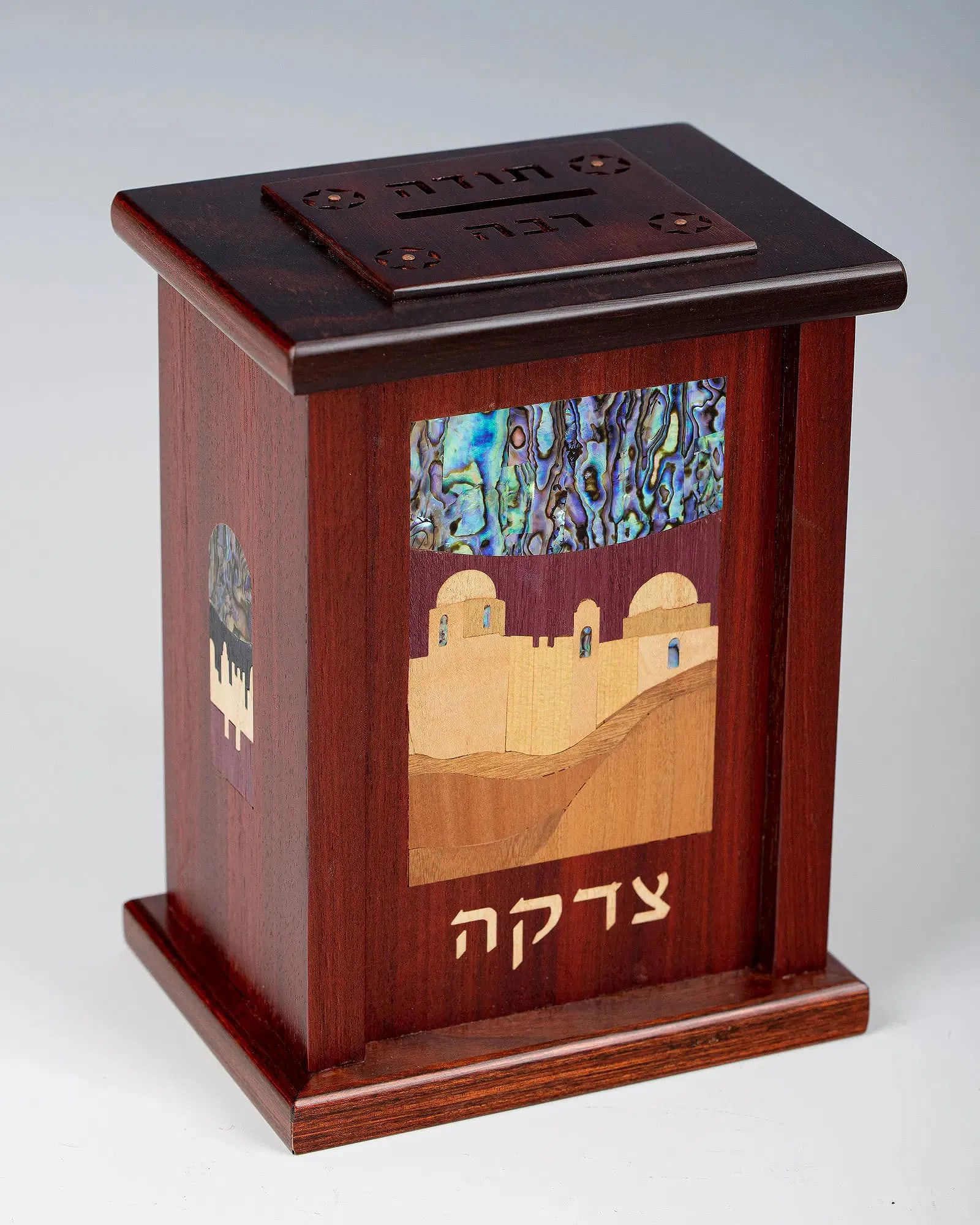 A LARGE CHARITY CONTAINER BY ALEX AND LORELEI GRUSS. Brooklyn, Modern: Modern. Four sided with inlaid mother of pearl and multi colored wood design. 7.5" tall.