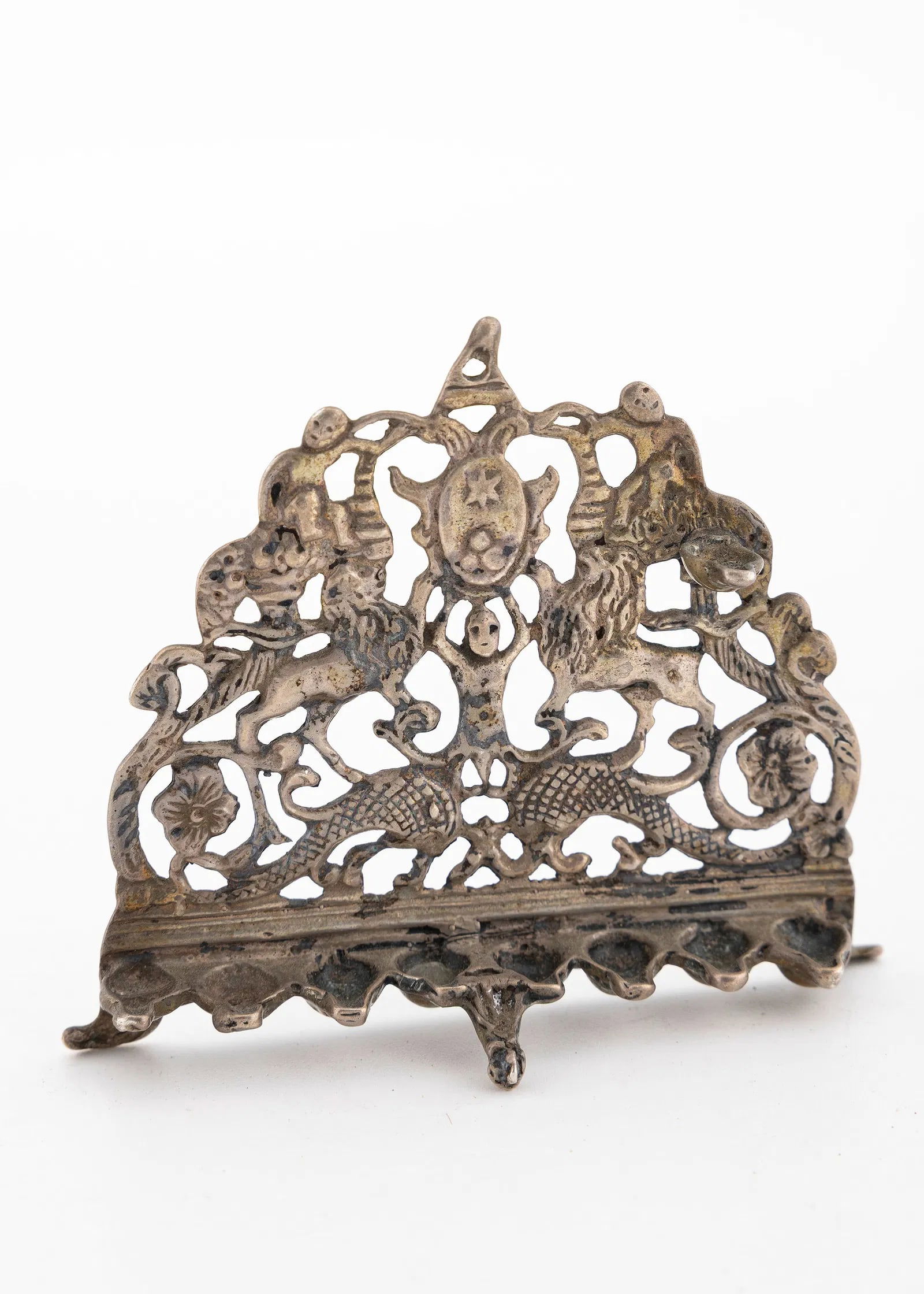 A MINIATURE SILVER HANUKKAH LAMP. Probably Dutch, 20th century: A MINIATURE SILVER HANUKKAH LAMP. Probably Dutch, 20th century. In the shape of an early Italian model. 3.2" wide.