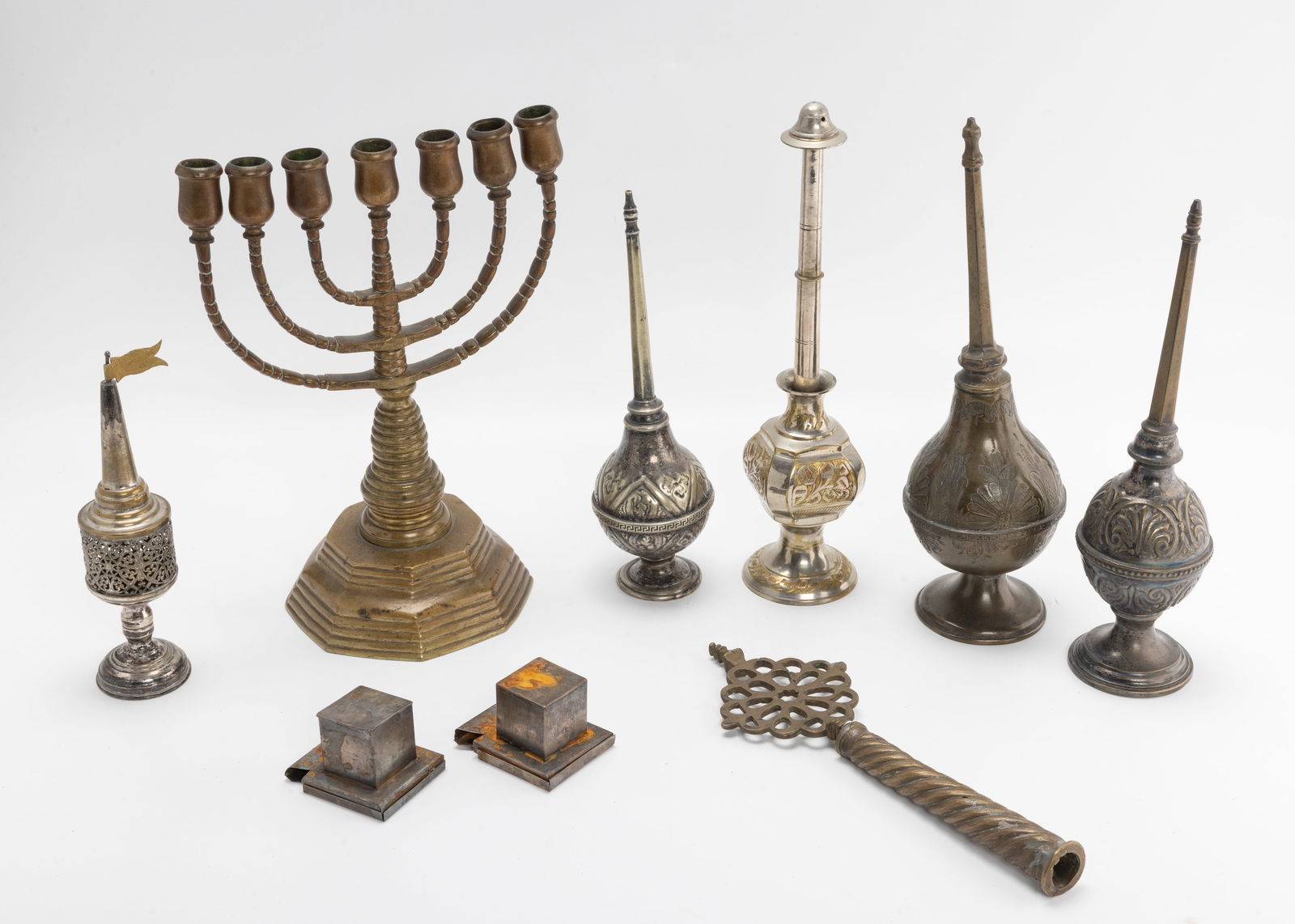 A COLLECTION OF JUDAICA OBJECTS INCLUDING ROSEWATER CONTAINERS (1 of 1)