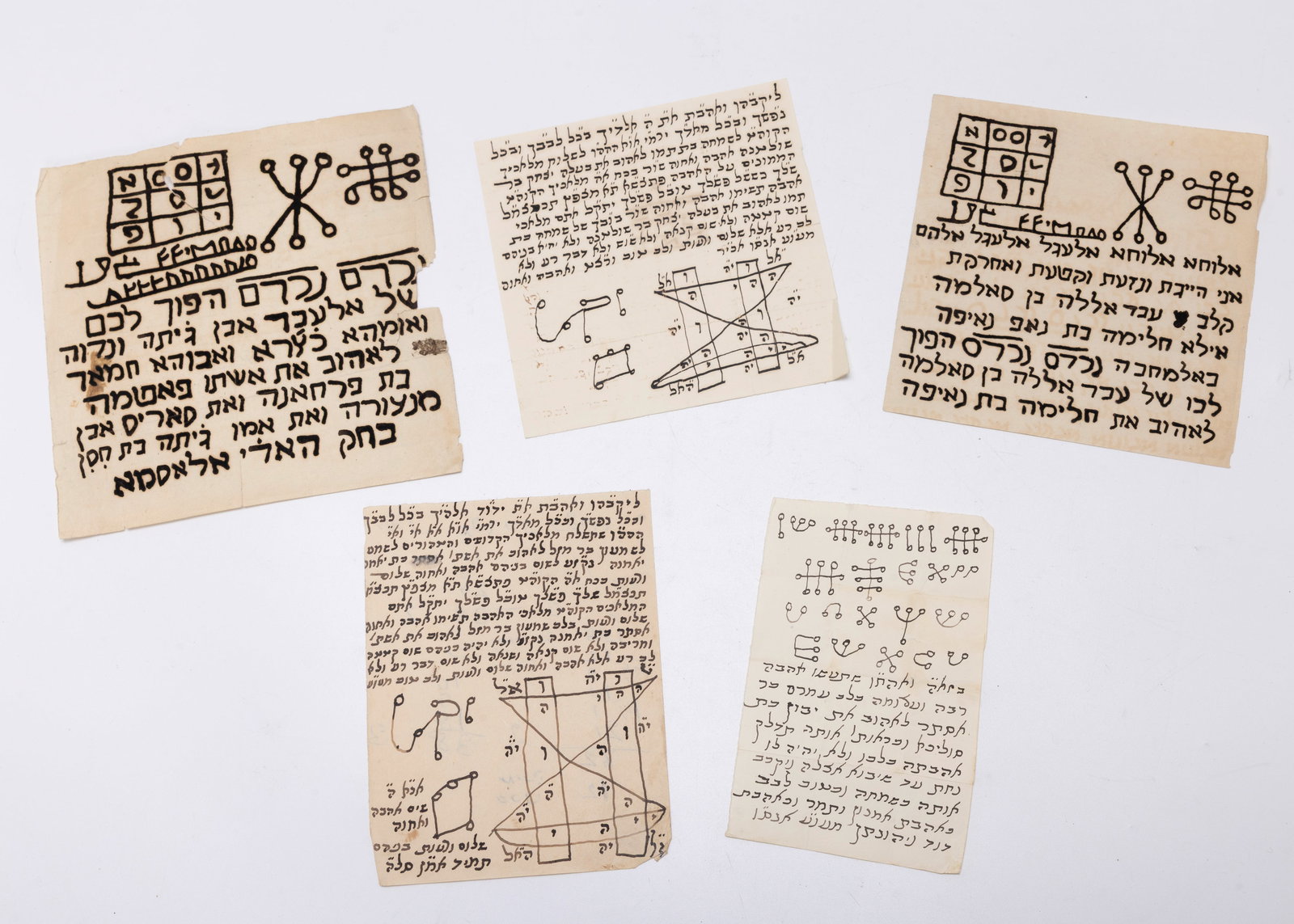 A GROUP OF HAND WRITTEN AMULETS (1 of 2)