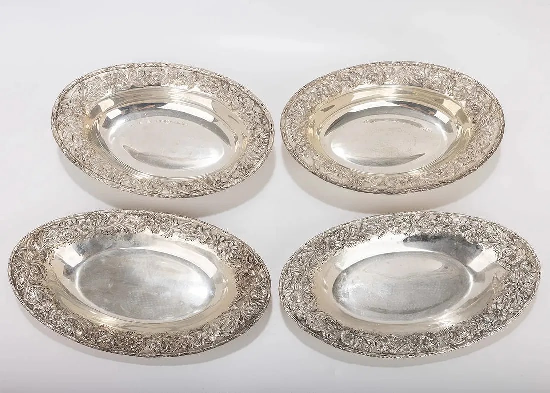 FOUR LARGE STERLING SILVER SERVING DISHES BY KIRK. Hand embossed repousee. (1 of 2)