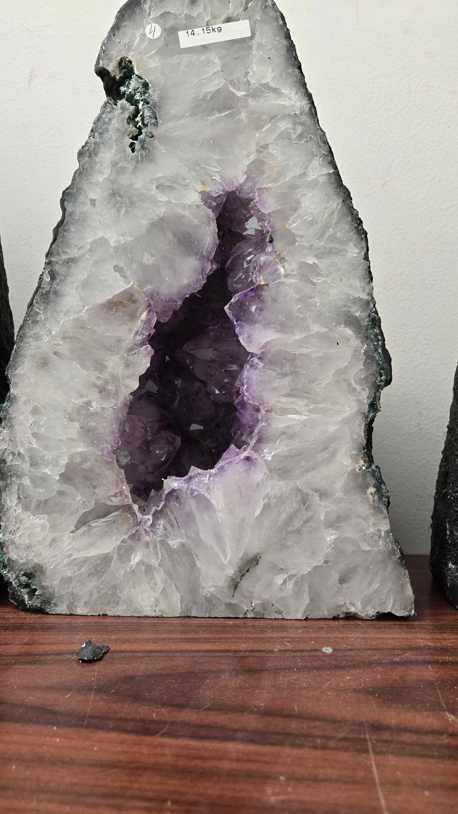 AN AMETHYST GEODE WITH POLISHED EDGES. (1 of 3)