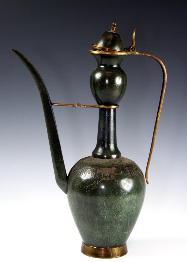 A BRASS TEAPOT BY PALL-BELL. Israel, 1970’s. With large: A BRASS TEAPOT BY PALL-BELL. Israel, 1970’s. With large spout. Painted green. 16.3” tall.