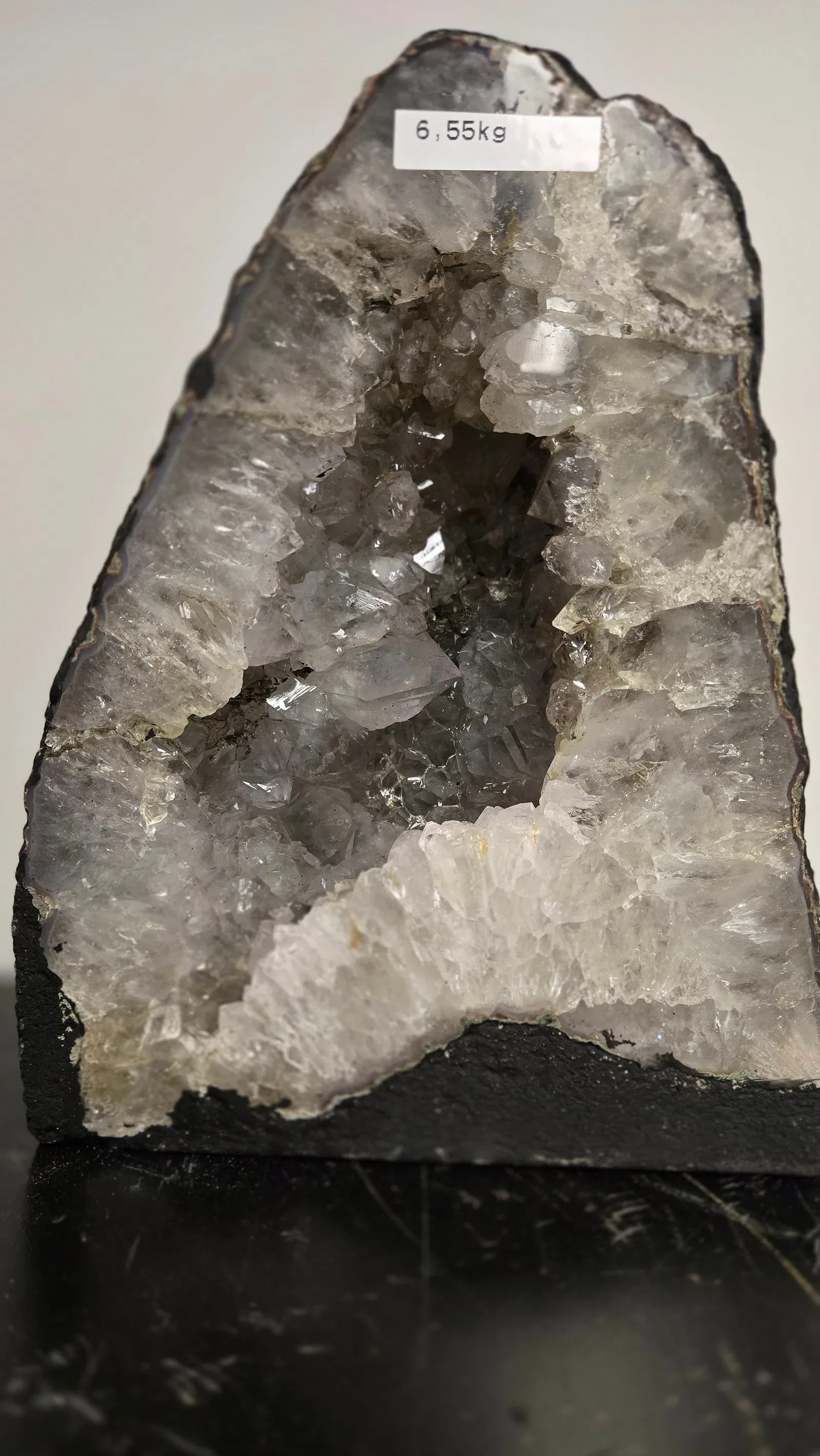 AMETHYST GEODE WITH POLISHED EDGES CATHEDRAL: Light purple in color. Polished edge. Triangular in shape. 9.5 tall and 6.5 kilograms