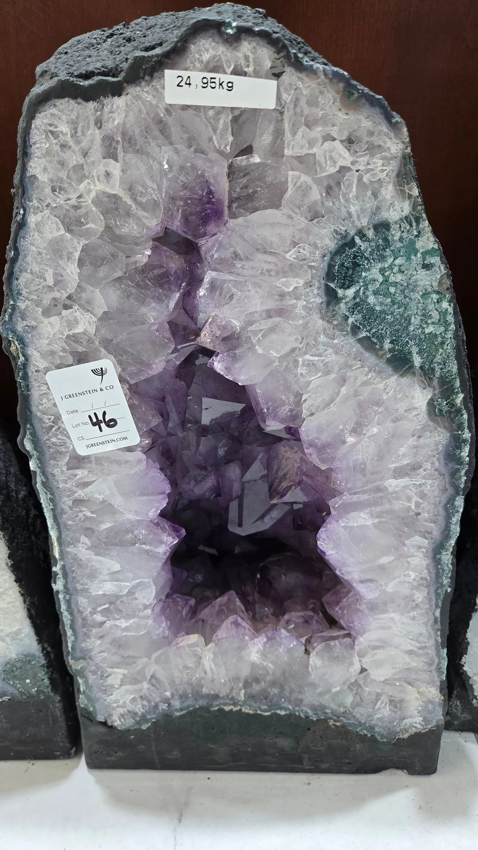 HIGHLY POLISHED AMETHYST GEODE. HUGE AND MAGNIFICENT: Light purple in color, 24.95 kilogram and 16" tall.