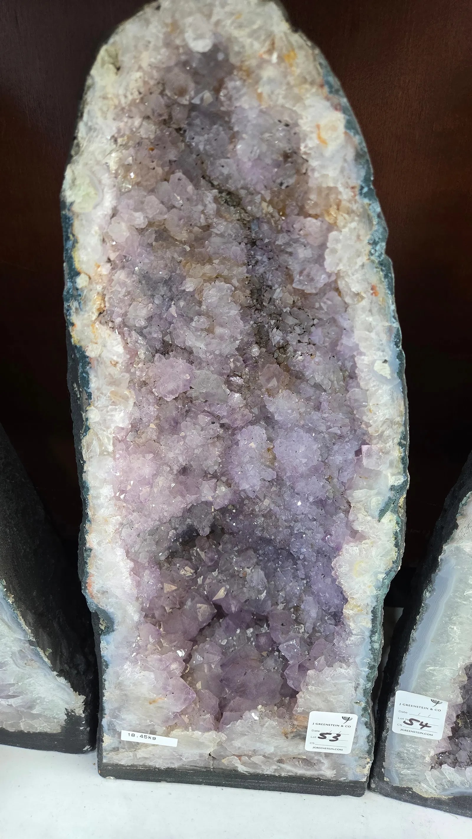 HIGHLY POLISHED AMETHYST GEODE. HUGE AND MAGNIFICENT: light purple in color. With a nice soft blue polished rim. 18.45 kilograms and 19" tall.