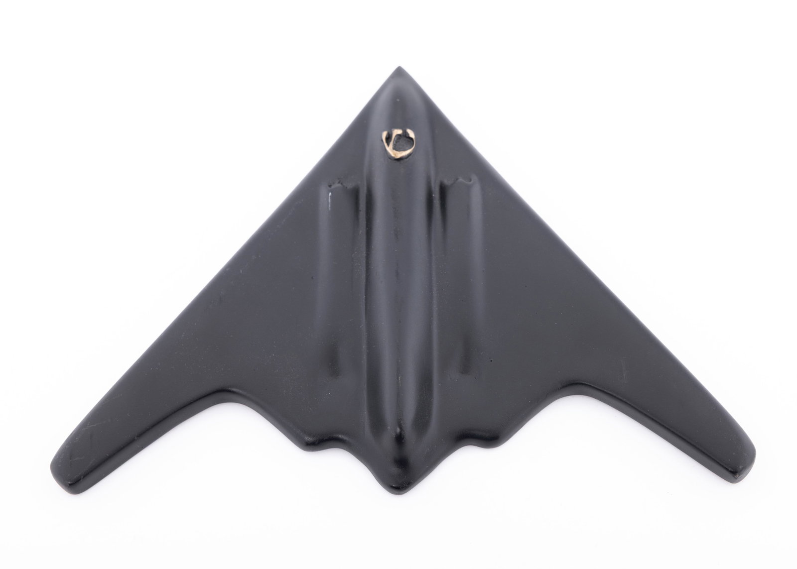 A HEAVY COPPER MEZUZAH IN THE SHAPE OF A B-2 BOMBER. Israel, modern (1 of 2)