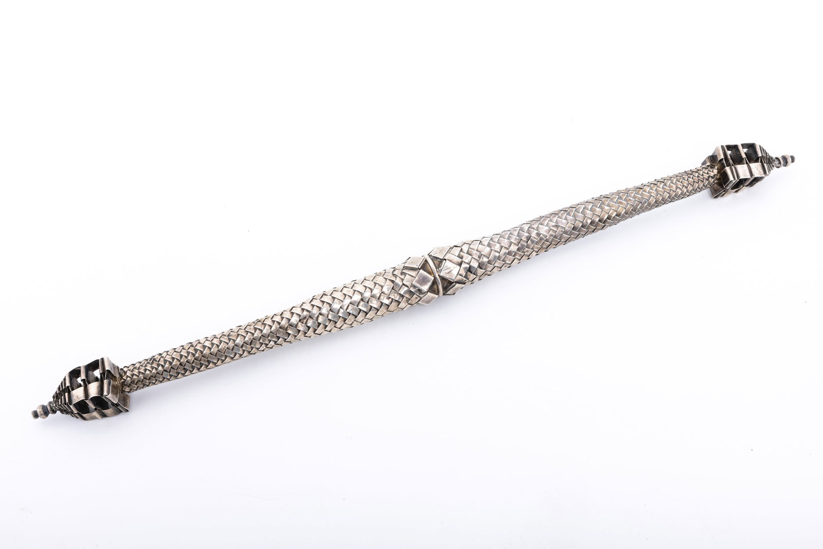 A STERLING SILVER HASIDIC SPICE CONTAINER. Probably American, c. 1980.: Made of interwoven sterling silver. The center screws together. 20" long and 192 grams
