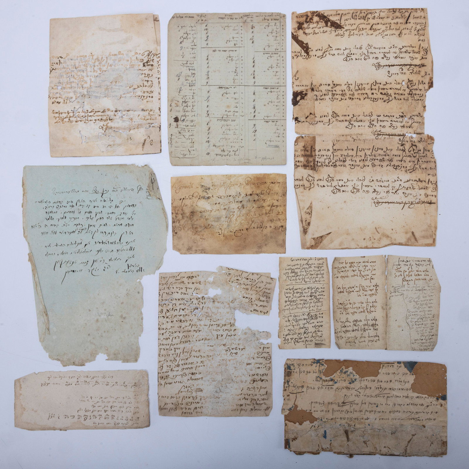 A COLLECTION OF VARIOUS JEWISH ANTIQUE DOCUMENTS AND MANUSCRIPTS. Mid 20th century and earlier. Moro: A COLLECTION OF VARIOUS JEWISH ANTIQUE DOCUMENTS AND MANUSCRIPTS. Mid 20th century and earlier. Morocco, Palestine, Rome, Vienna and other locations. Includes 9 getts from Morocco, approximately 20