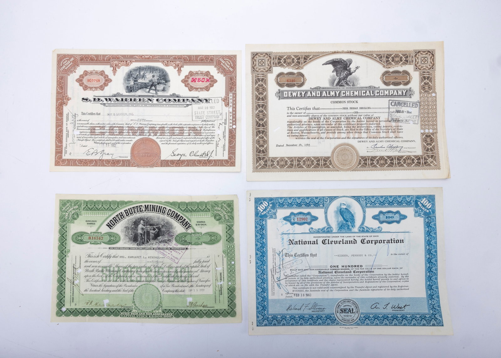 A GROUP OF FOUR ANTIQUE STOCK CERTIFICATES. Including the North Butte Mining Company, The National C (1 of 2)