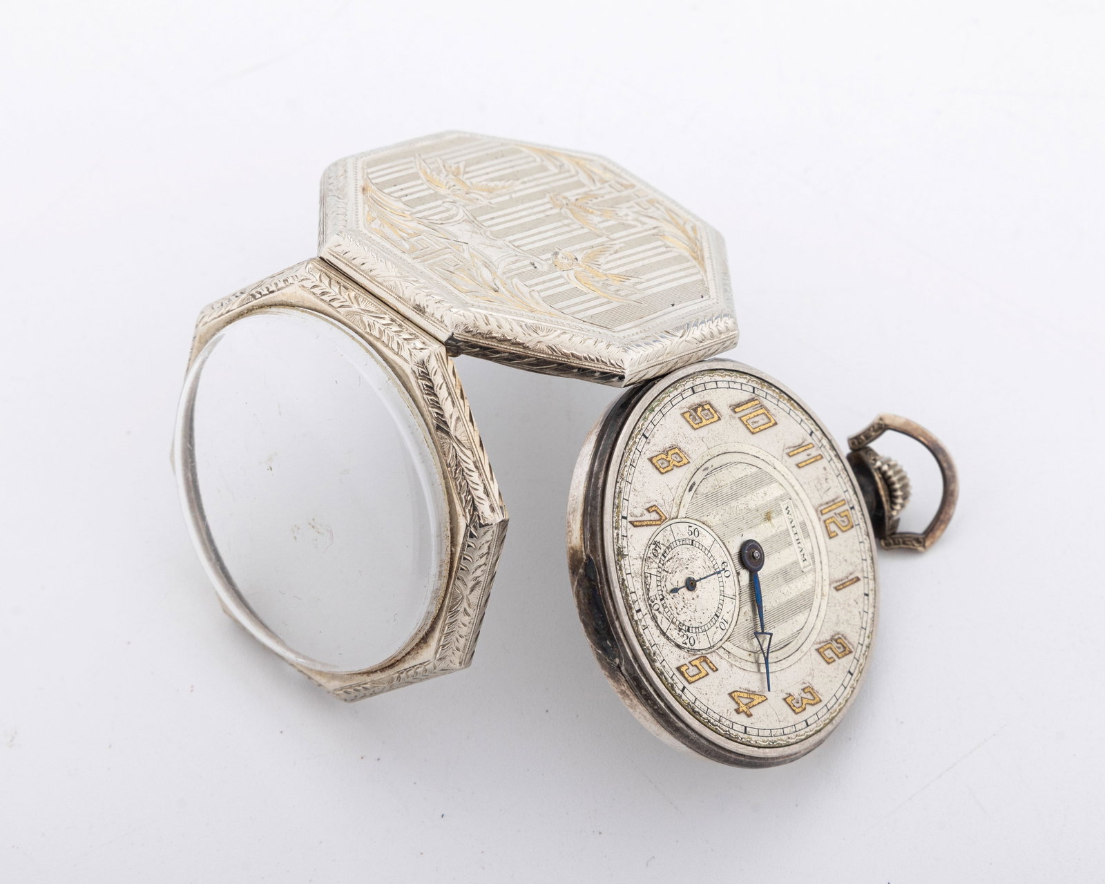 A14K POCKET WATCH BY THE AMERICAN WALTHAM WATCH COMPANY.: In a bright cut 14k case, decorated with birds. 17 jewels. 1.7" wide face. Lacking one hand.