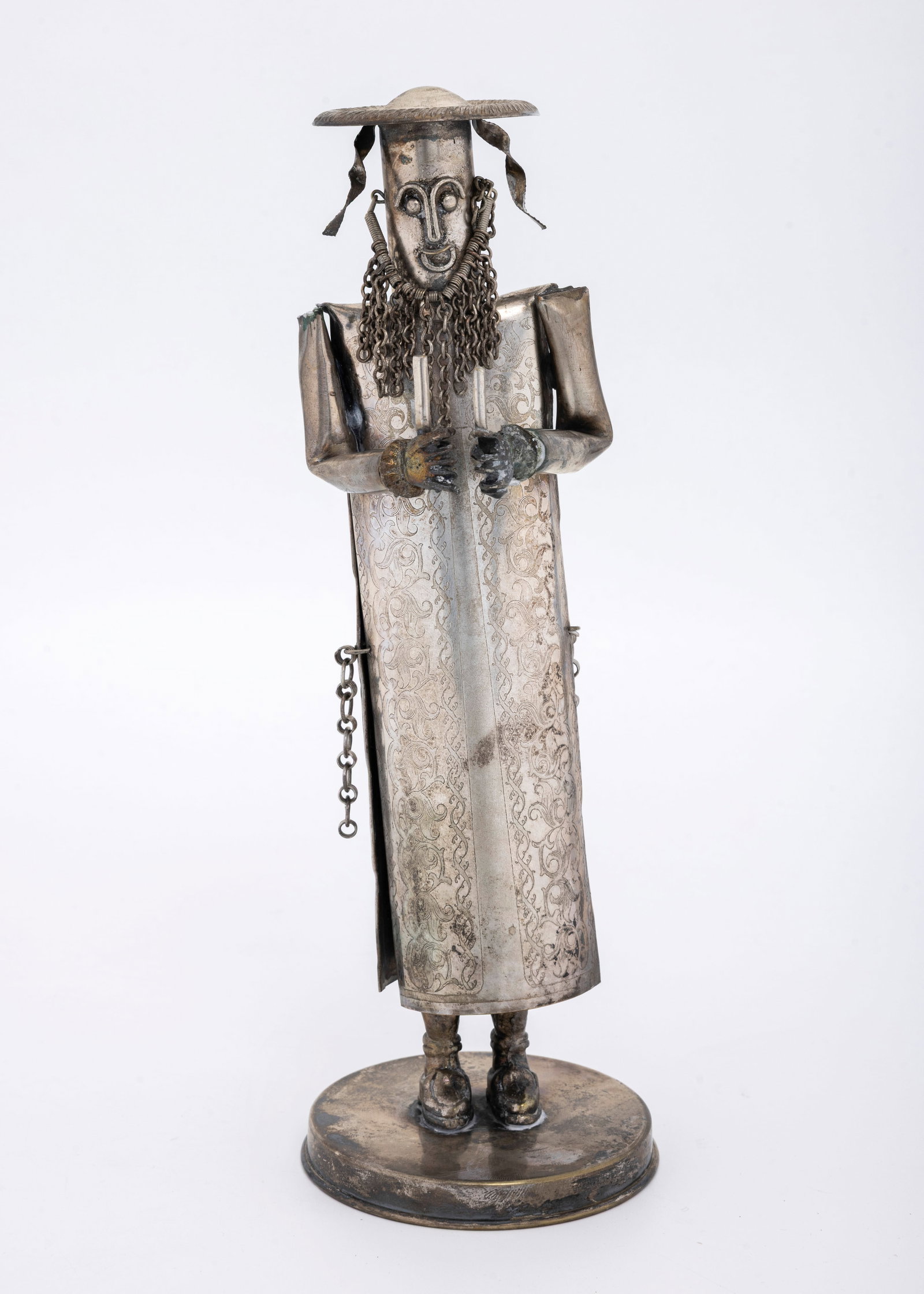 A FIGURE OF A HASIDIC JEW IN PRAYER: Hand made on a circular base with a beard, payos and traditional Hasidic garb. Goes back and forth like a bobble head
