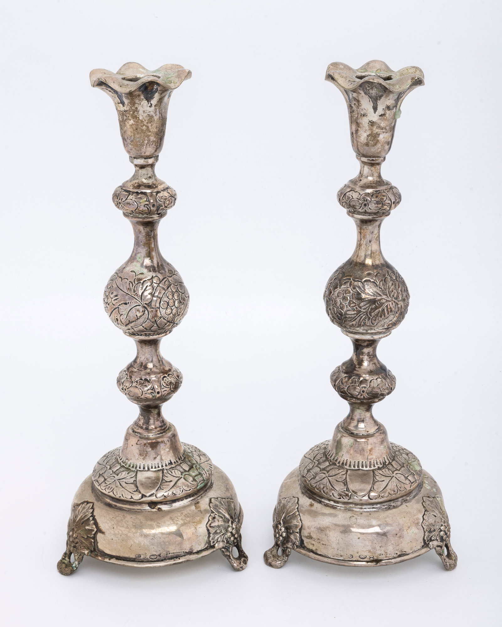 A PAIR OF LARGE RUSSIAN SABBATH CANDLESTICKS. Warsaw, c. 1880 (1 of 3)