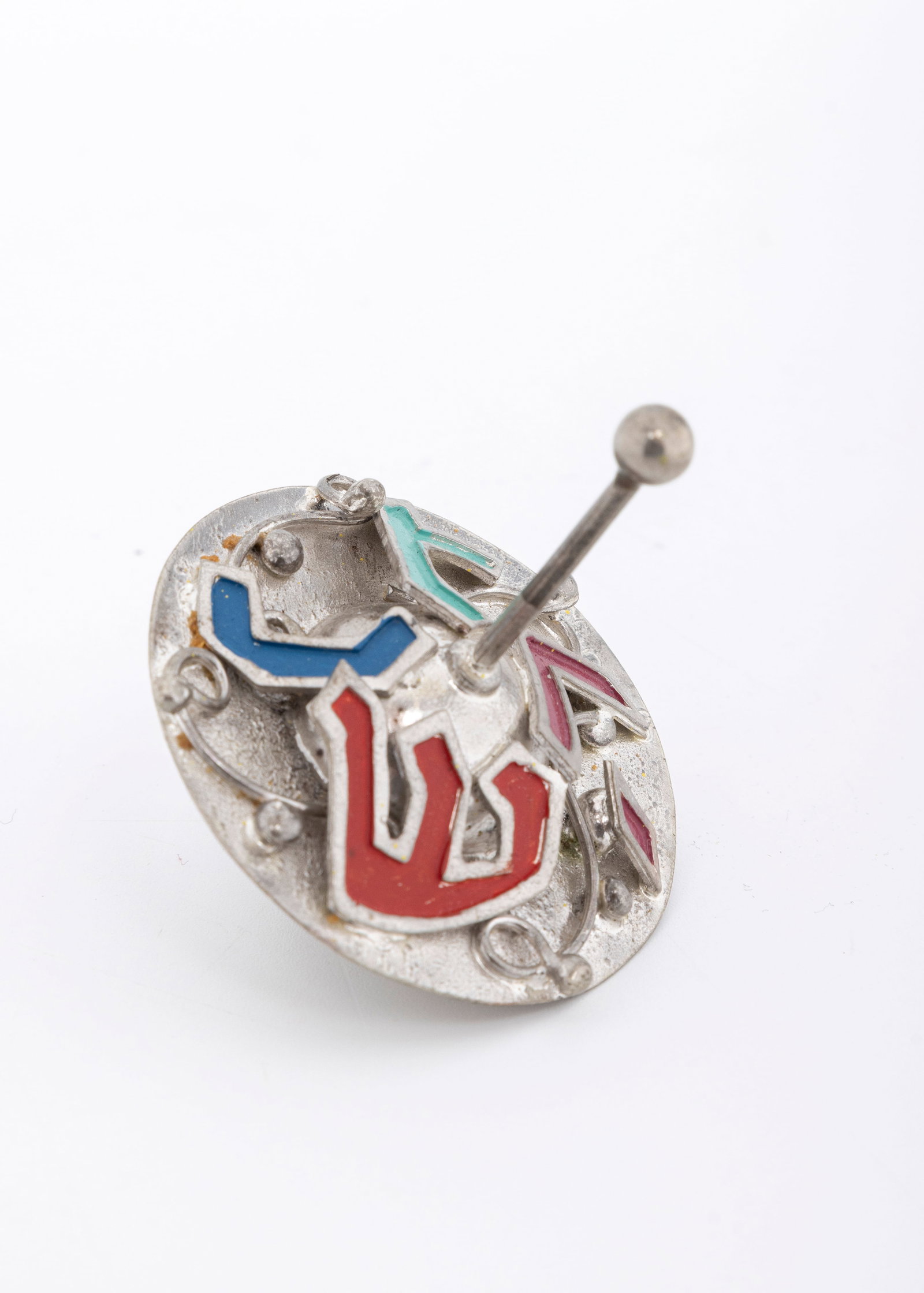 A SILVER AND ENAMEL DREIDEL BY SAMMY ZILKA, Israel, modern.: In modern design. With enamel design. 2.5" tall. 46.7 grams