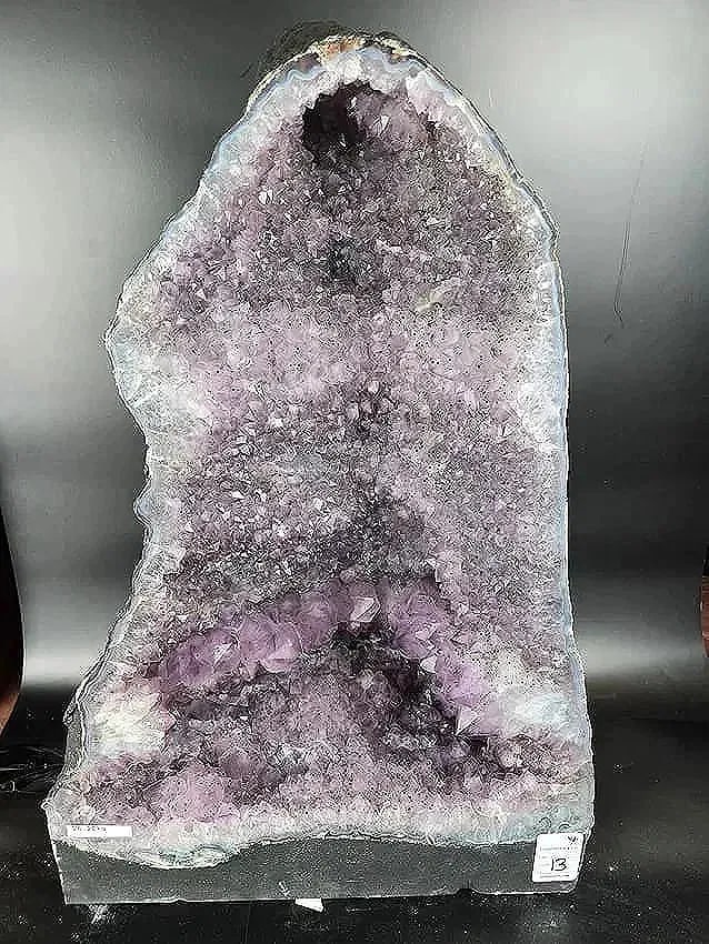 AMETHYST CATHEDRAL GEODE WITH POLISHED EDGES: 21" TALL X 14" AT IT'S WIDEST 26.2 KILOGRAMS