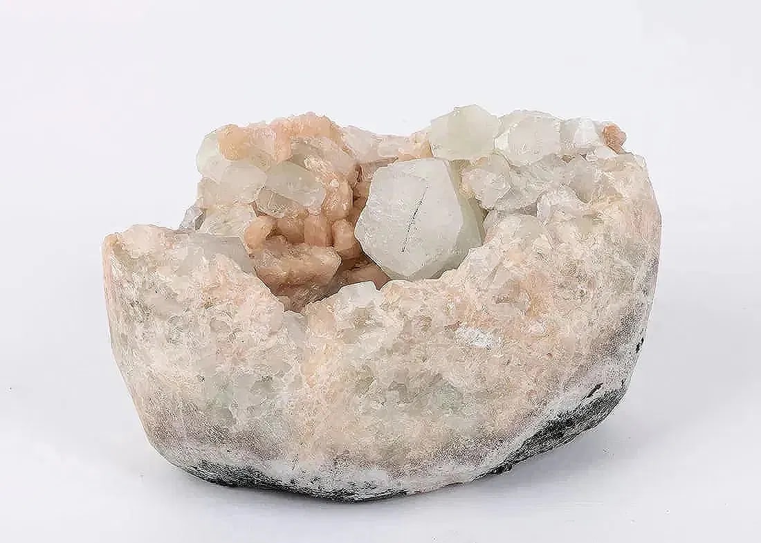 AN APOPHYLLITE SPECIMEN: 8” x 5.5” x 3.1”. The weight is 2355.8 grams.