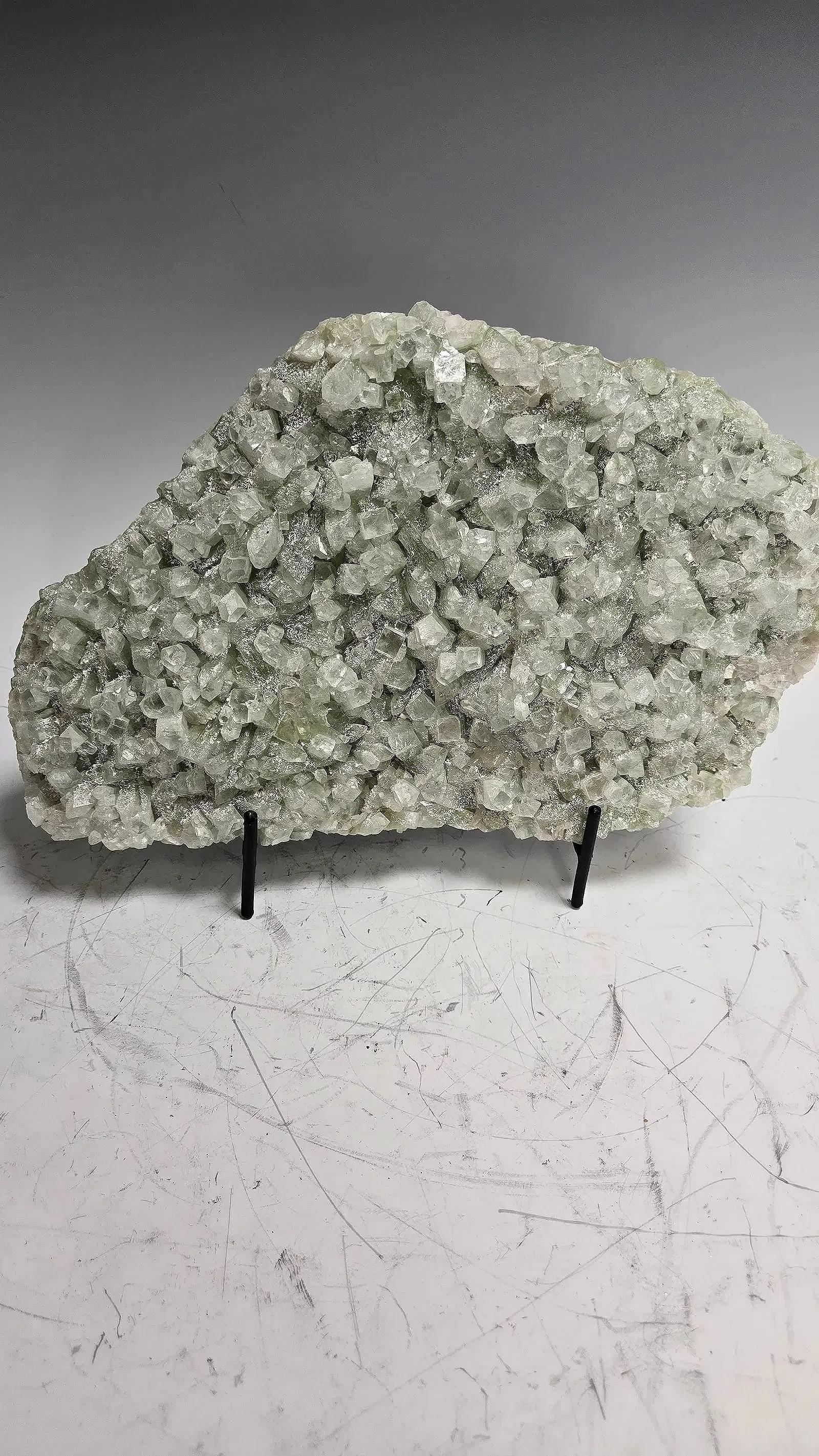 AN APOPHYLITE SPECIMEN INDIA: Green in color. 11" long.