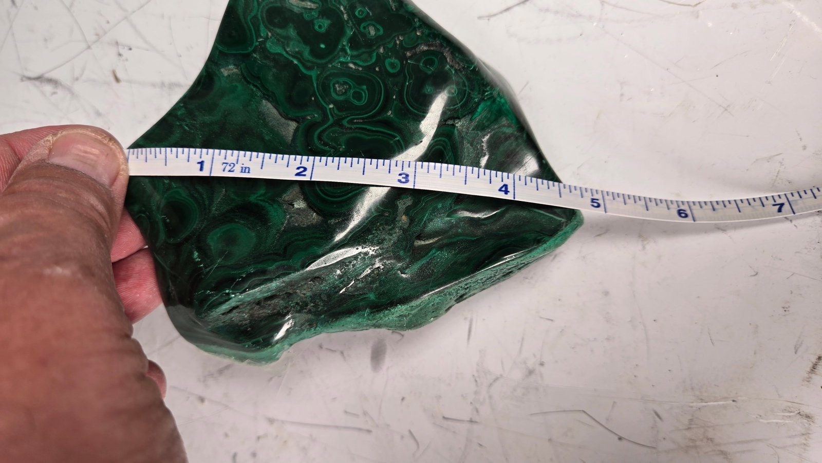 A HIGHLY POLISHED MALACHITE SPECIMEN (1 of 5)