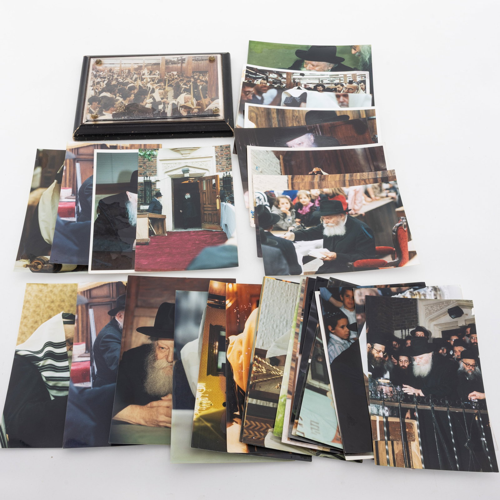 A COLLECTION OF 33 TYPE ONE PHOTOGRAPHS OF THE LUBAVITCER REBBE: Thirty three different photographs of the Rebbe in different stages of his day and in 770.