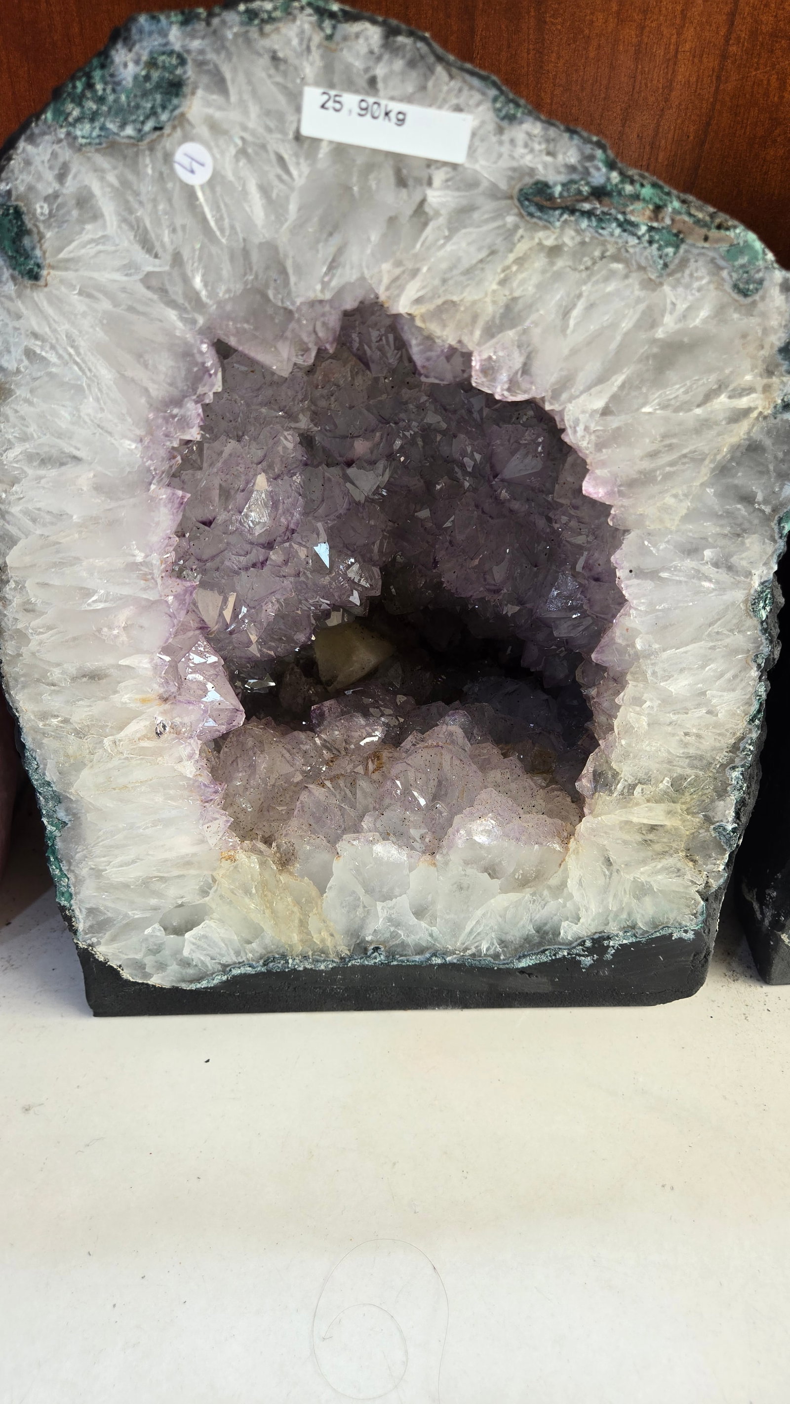 AN AMETHYST GEODE WITH POLISHED EDGES: 25kg and 14" tall. Nice deep example.