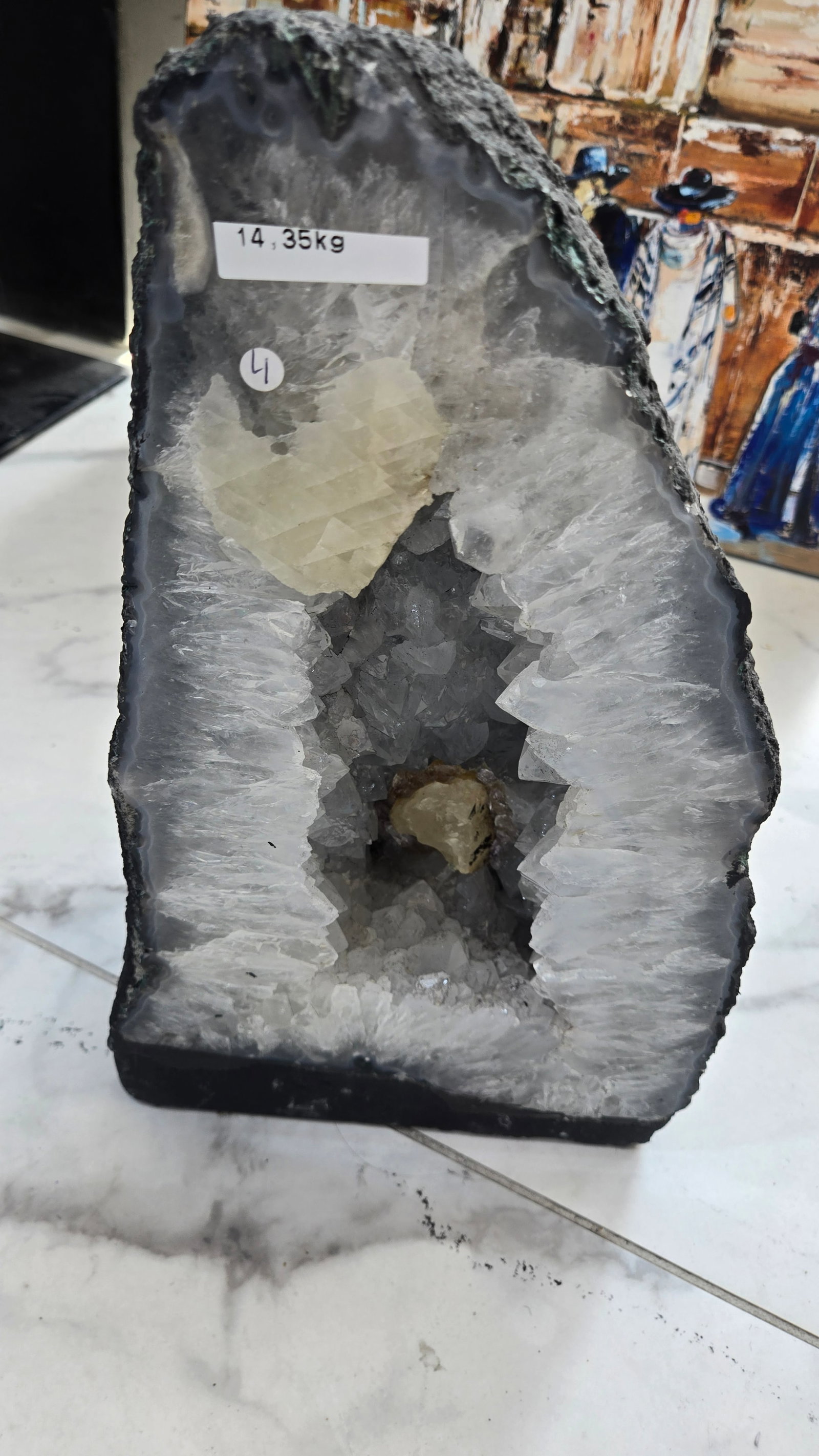 AN AMETHYST GEODE WITH POLISHED EDGES (1 of 4)