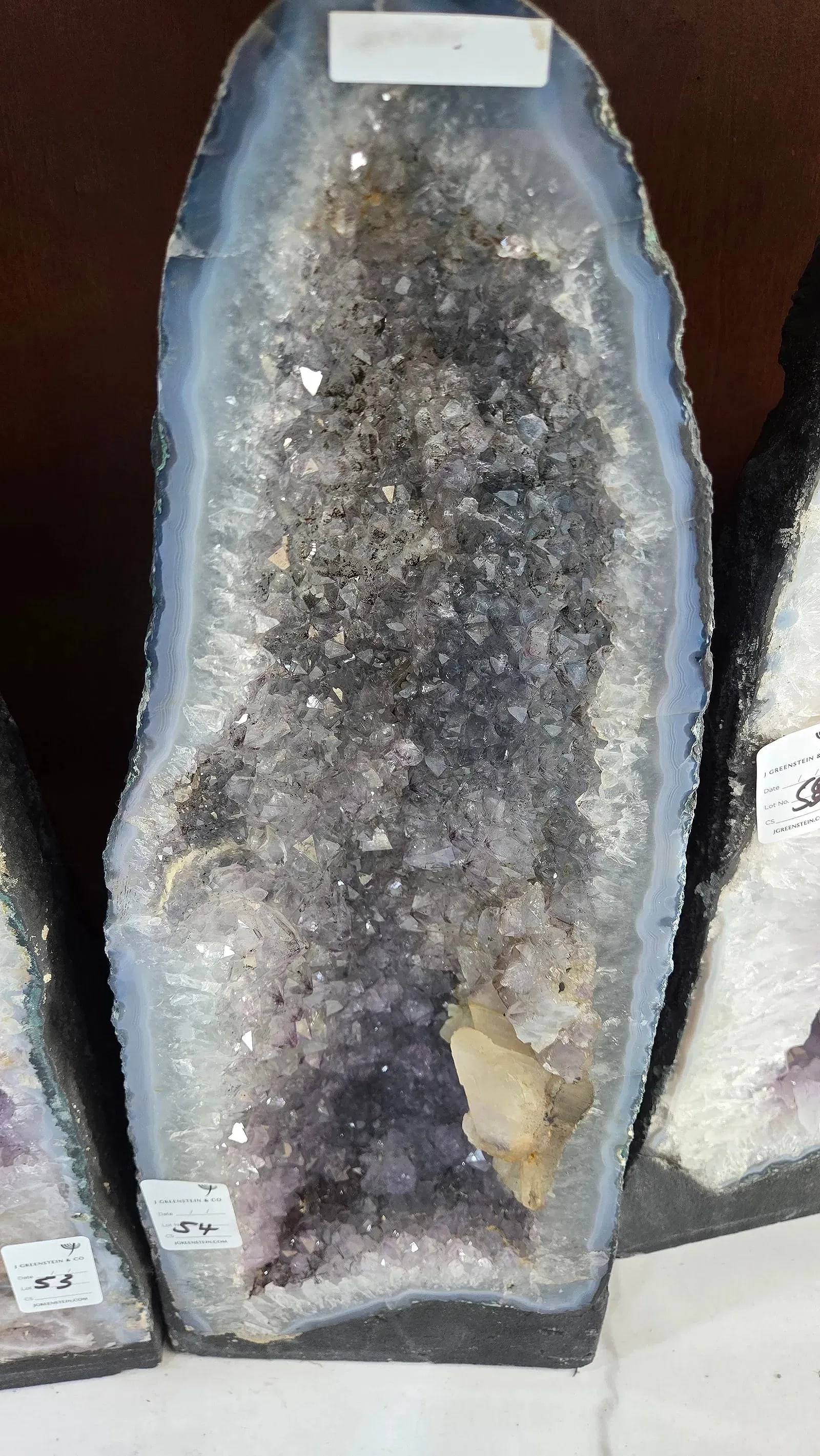 HIGHLY POLISHED AMETHYST GEODE. HUGE AND MAGNIFICENT: light purple in color. With a nice soft blue polished rim. kilograms and 19" tall.