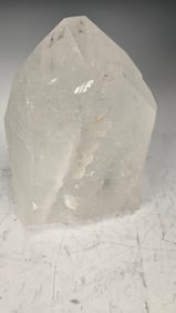 A MASSIVE SINGULAR QUARTZ CRYSTAL - 4