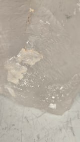 A MASSIVE SINGULAR QUARTZ CRYSTAL - 6