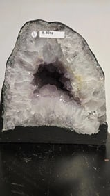 AMETHYST GEODE WITH POLISHED EDGES CATHEDRAL: Light purple in color. Polished edge. Triangular in shape. 8.2" tall and 8.8 kilograms