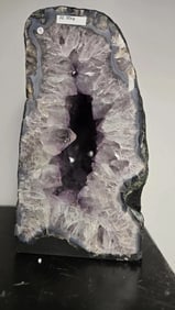 AMETHYST GEODE WITH POLISHED EDGES CATHEDRAL: Light purple in color. Polished edge. Triangular in shape. 14.5" tall and 23.5 kilograms