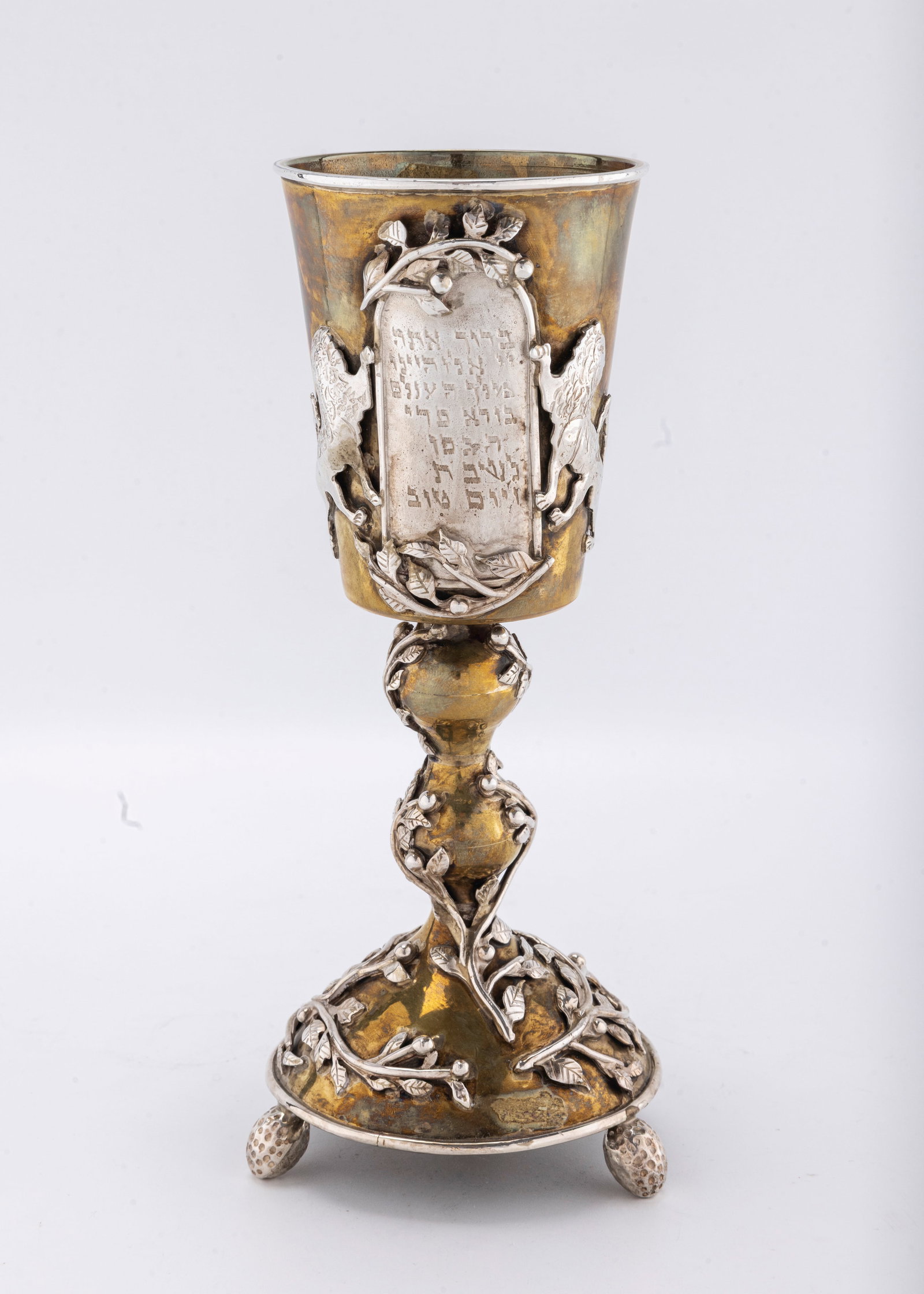 A SILVER AND MIXED METAL KIDDUSH CUP BY MICHAEL ENDE. Jerusalem, c. 1985 (1 of 3)
