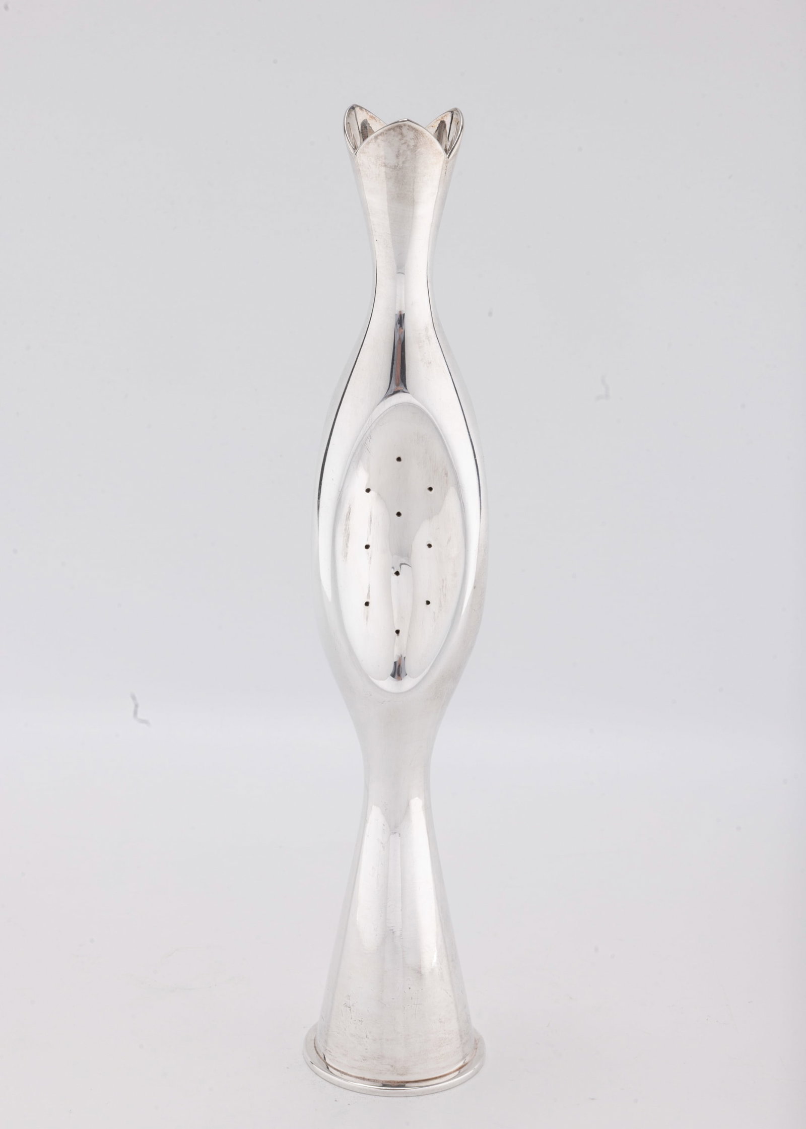 A RARE SILVER SPICE TOWER BY ZELIG SEGAL. Israel, c. 1990: On an inward tapering domed base. In the shape of a three sided stylized pomegrate. Signed Z. Segal