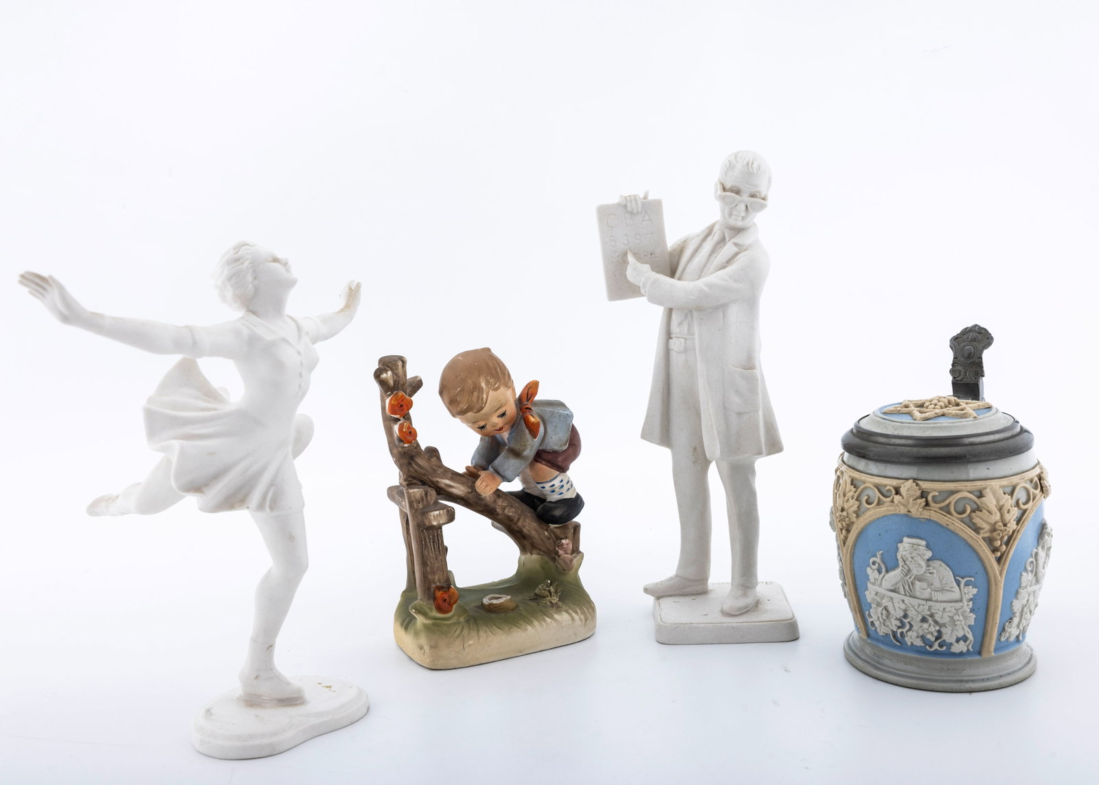 A BEER STEIN WITH A SIX POINTED STAR AND OTHER FIGURINES (1 of 8)
