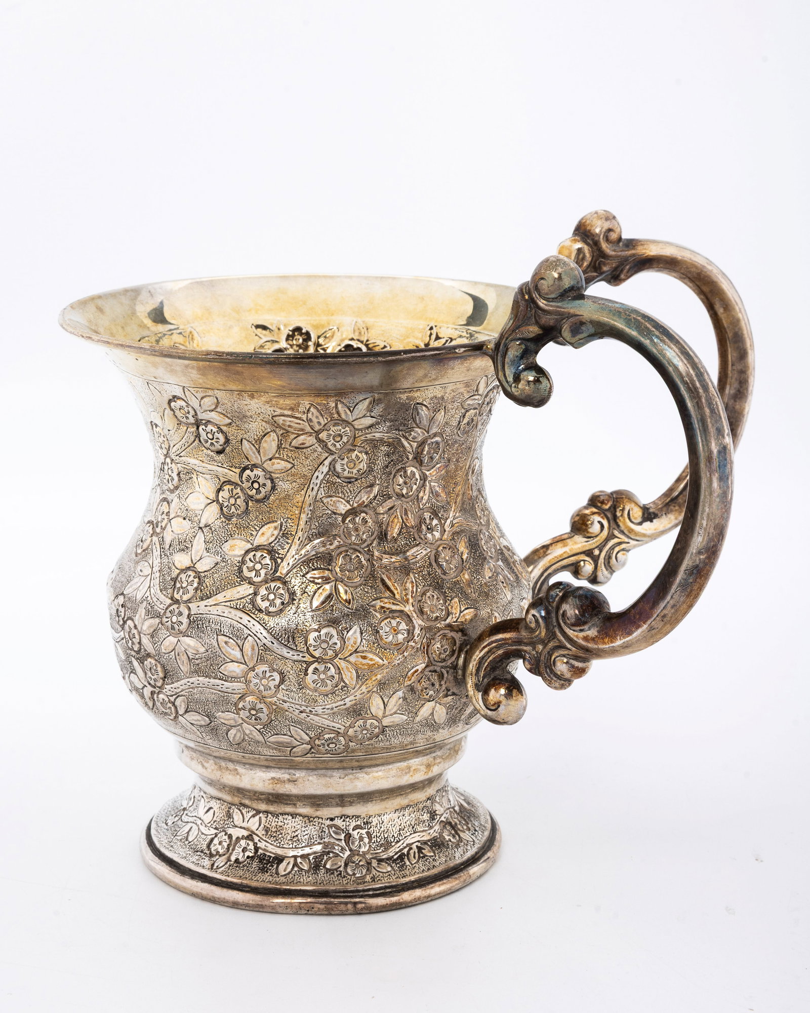 A LARGE STERLING SILVER WASHING CUP. Probably Israel, modern.: Exceptionally well made. Chased with floral and vine designs. Wth two handles. Marked 925 sterling. 6.8" tall and 399 grams