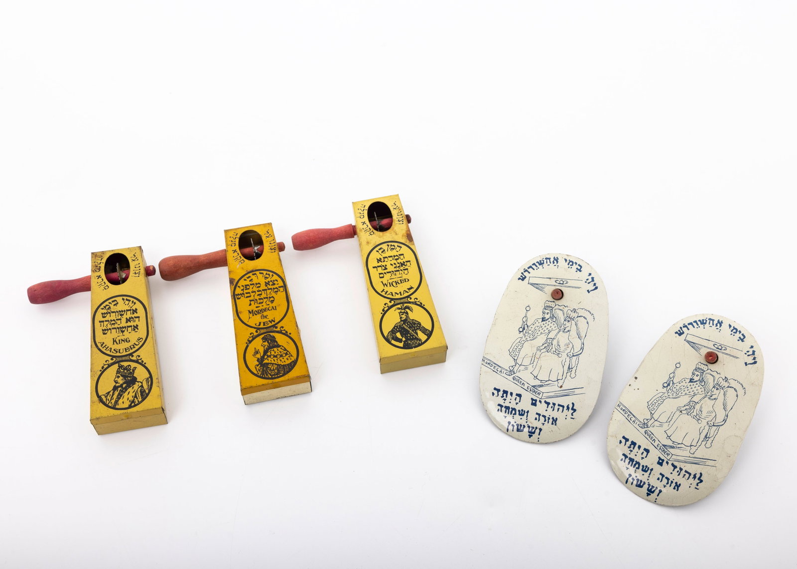 A COLLECTION OF FIVE PRINTED TIN GRAGGERS: American, c. 1930 - 1950. Each printed with appropriate purim sayings.
