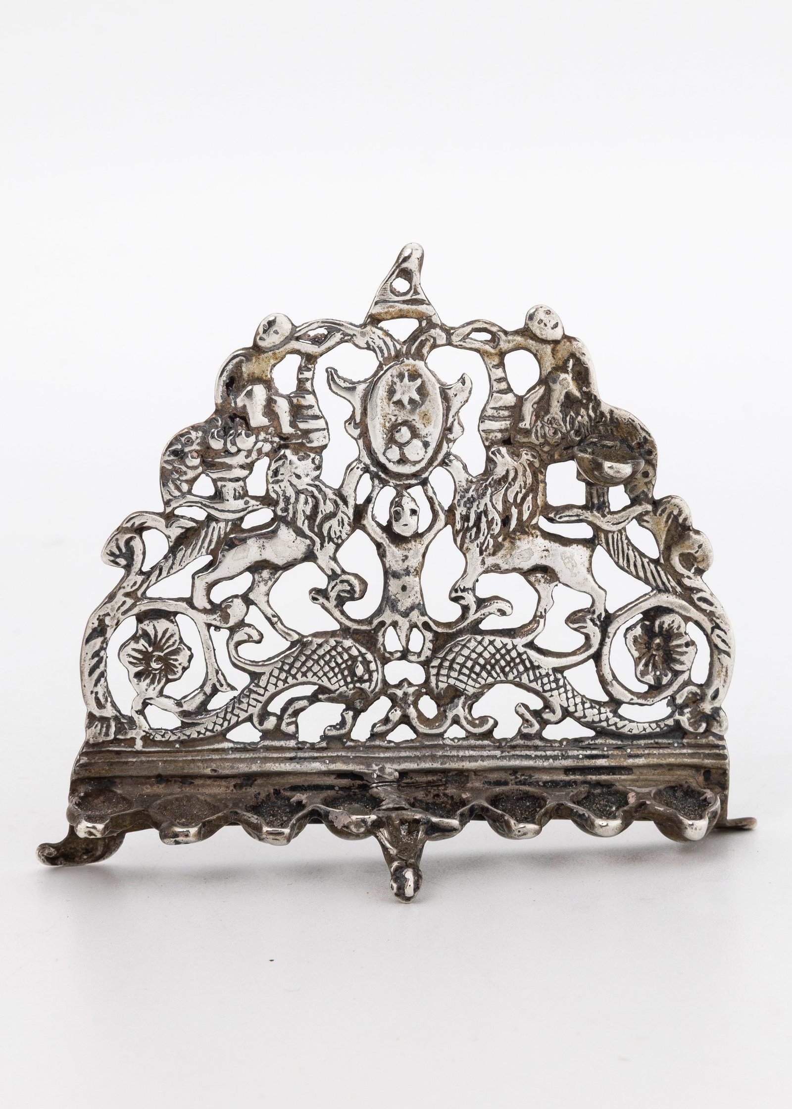A MINIATURE SILVER HANUKKAH LAMP. Probably Dutch, 1920s. In the shape of an early Italian model. 3.2 (1 of 2)