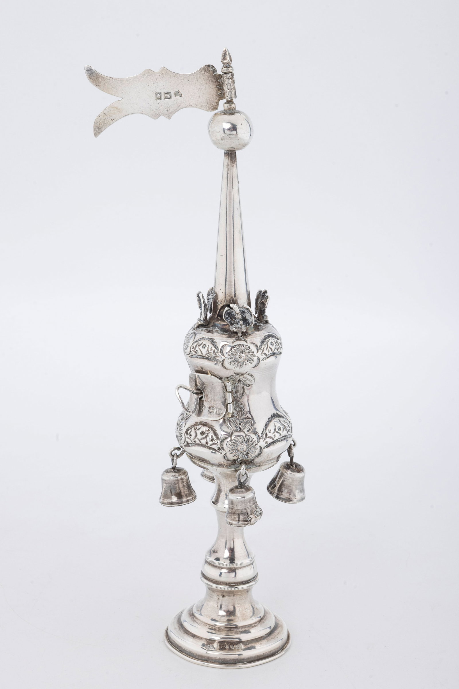 A STERLING SILVER SPICE TOWER BY Rosenzweig, Taitelbaum & Co (Jacob Rozenzweig) London, 1923.: On a round base with a baluster shaped stem that connects to a spool shaped body that s fitted with four bells and four birds. Fitted with a large marked flag. 9.5" tall and 128.9 grams