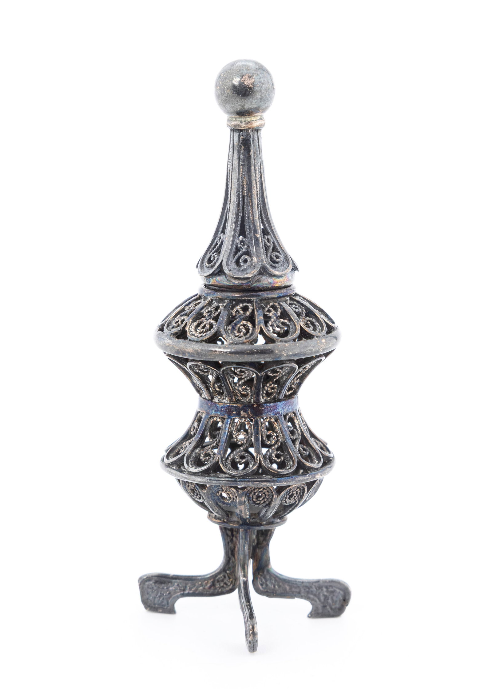 A STERLING SILVER SPICE TOWER. Israel, c. 1990: Filigree in form. On four feet with a baluster shaped body. 3.9" tall