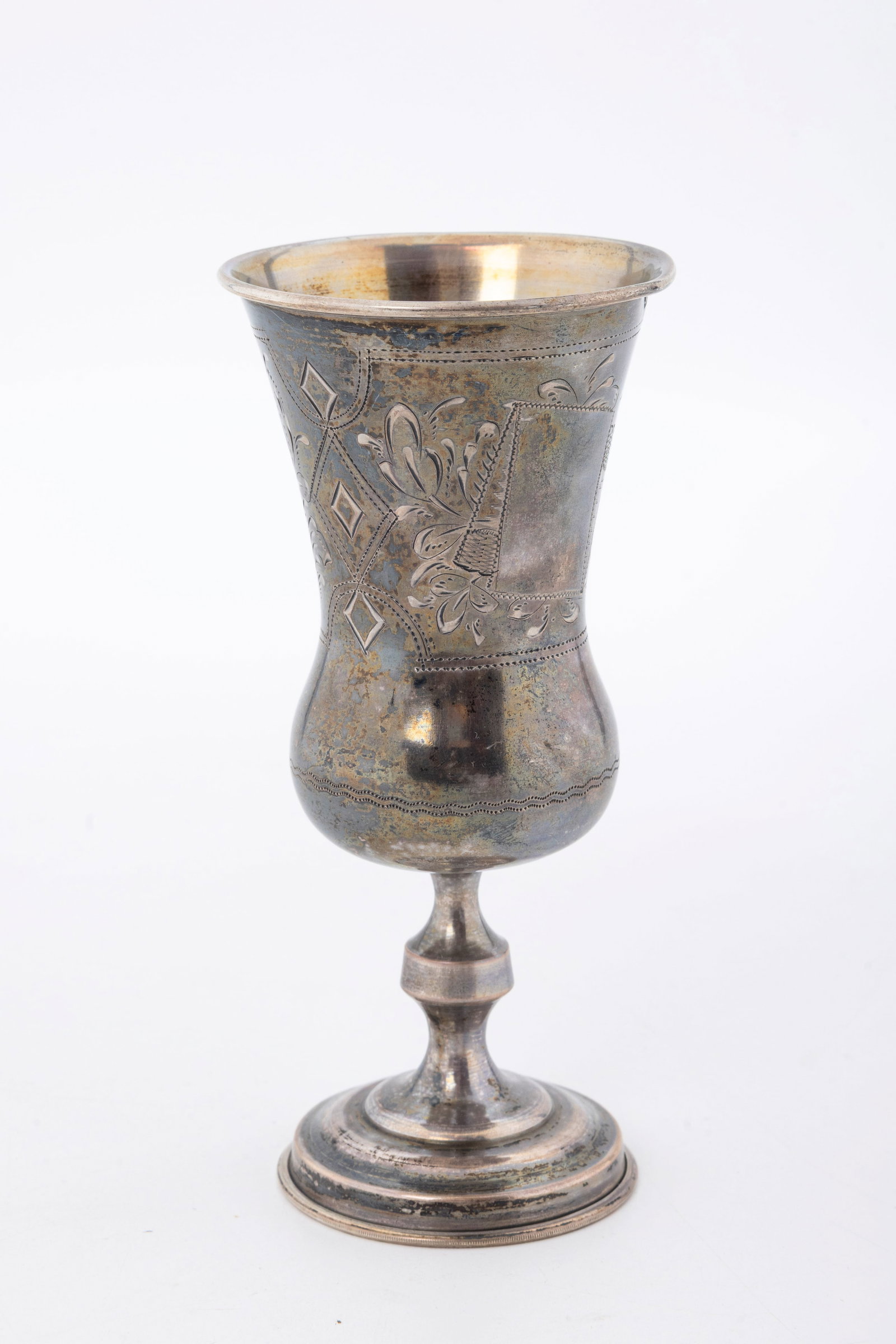 A LARGE SILVER KIDDUSH GOBLET. Russian, c. 1880: On a round base with a knobbed stem and an outwardly tapering goblet. Marked with an 84. 5" tall and 88.4 grams