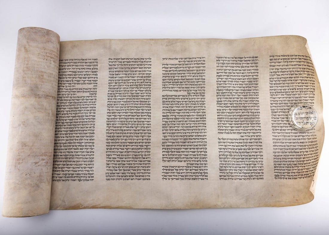 A PARTIAL SEFER TORAH. Toldos to the beginning of MIketz Hand written on natural klaf. Ashkenaz Beis: A PARTIAL SEFER TORAH. Toldos to the beginning of MIketzHand written on natural klaf. Ashkenaz Beis Yosef. 18" klaf.
