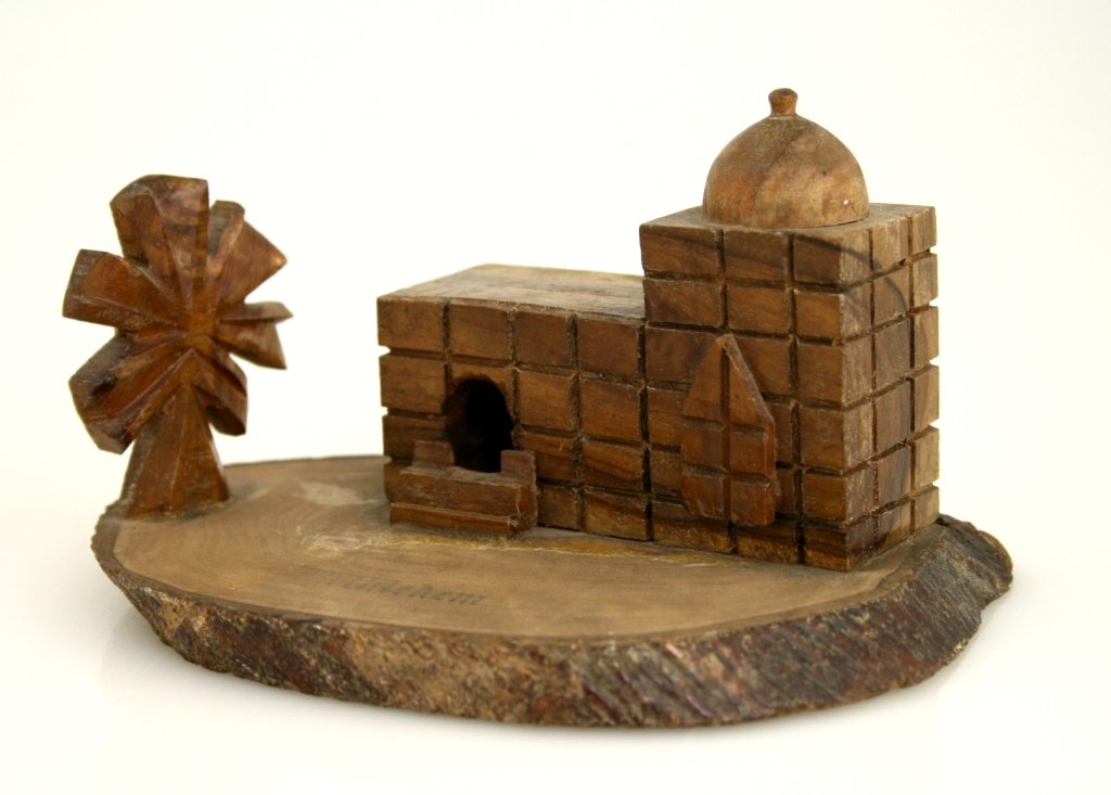 A CARVED OLIVEWOOD SCENE OF RACHEL’S TOMB. Palestine, 1: A CARVED OLIVEWOOD SCENE OF RACHEL’S TOMB. Palestine, 1930’s. Hand carved with the scene of the old Kever Rachel. Marked Bethlehem. 5.5” wide.