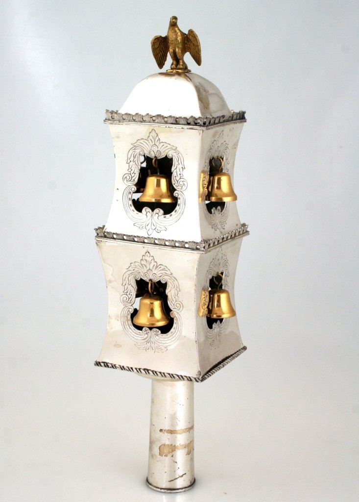 A SINGLE TORAH FINIAL. Probably Germany, 19th century.: A SINGLE TORAH FINIAL. Probably Germany, 19th century. On tubular stave. Comprised of two square sections with hand carved border. Topped by a bird finial. 13” tall.