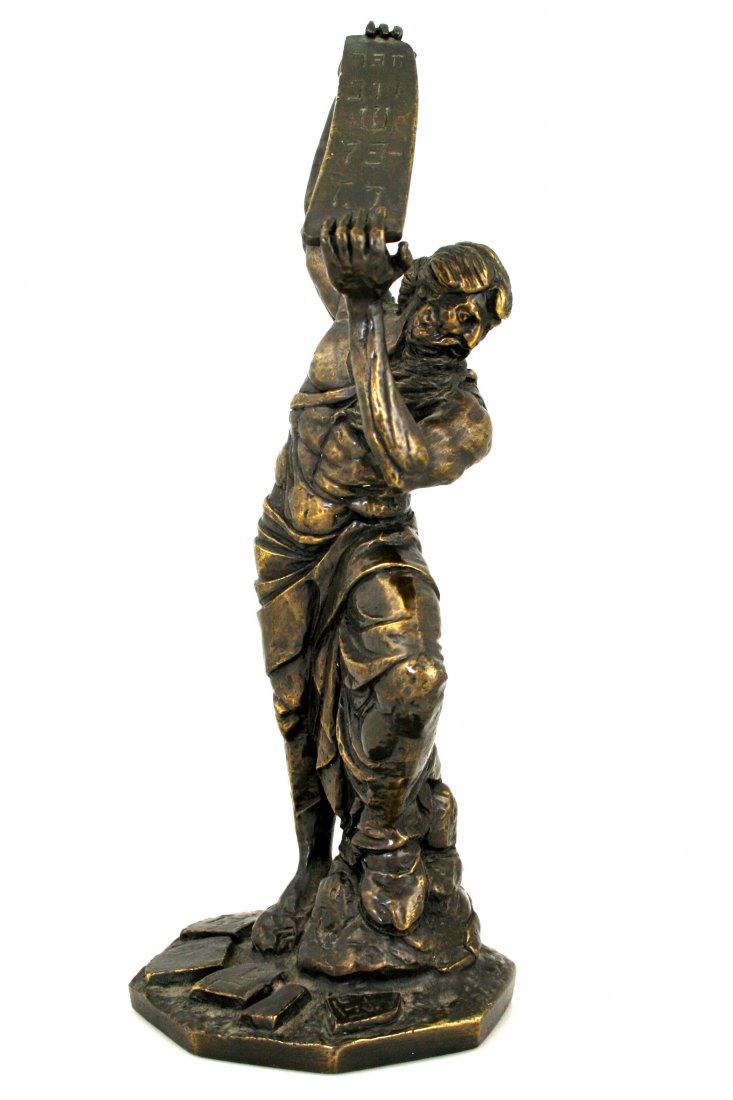 AN ANTIQUE STATUE BY KNOSIS. American, 1920. Cast bron: AN ANTIQUE STATUE BY KNOSIS. American, 1920. Cast bronze statue depicting Moses and the ten commandments. The statue measures about 10½" tall and it’s signed on the back with the name Konisis and h