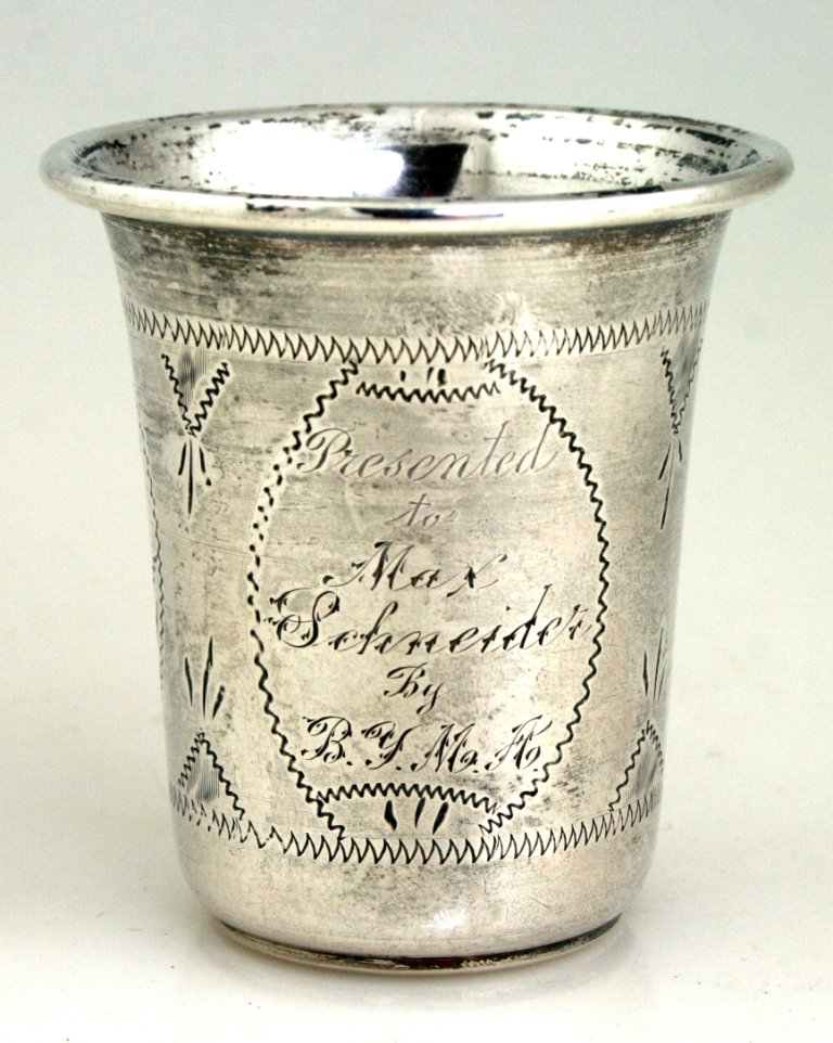 A SILVER KIDDUSH BEAKER. American, 1935. Engraved in En: A SILVER KIDDUSH BEAKER. American, 1935. Engraved in English “PRESENTED TO MAX SCHNEIDER BY BYMA” 3” tall.
