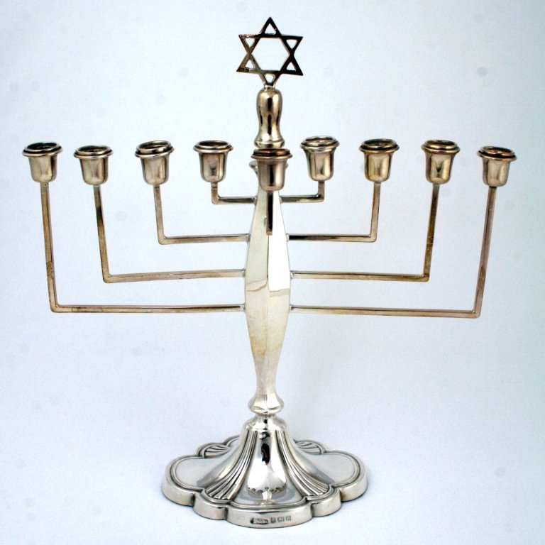 A SILVER MENORAH. Birmingham, 1904. In Art Deco design.: A SILVER MENORAH. Birmingham, 1904. In Art Deco design. Marked. 10" tall. Estimate $600 - 900