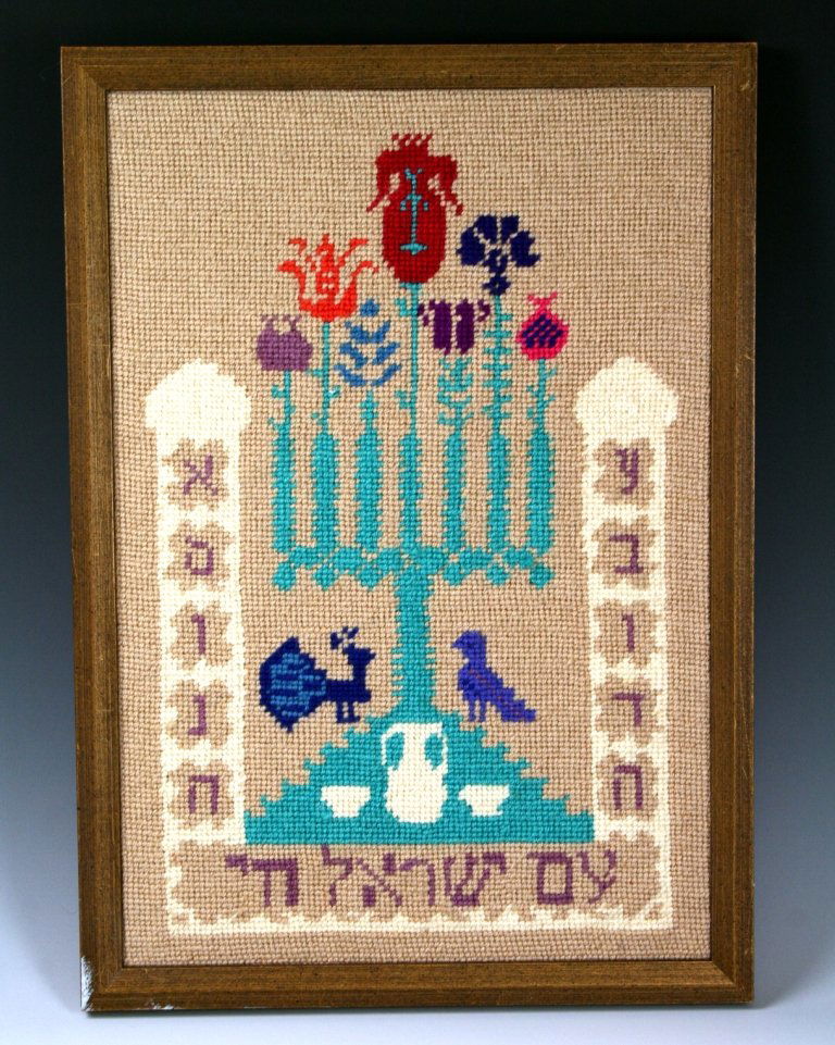 A LARGE NEEDLEPOINT. USA, c. 1950. Spelling out â€œAM: A LARGE NEEDLEPOINT. USA, c. 1950. Spelling out “AM YISROEL CHAI". 11" x 16". Estimate $40 - 60